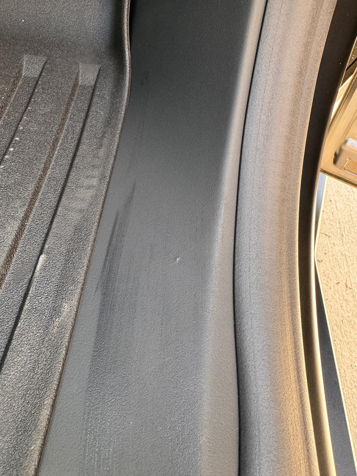 Tesla Cybertruck Inquiry: Front Passenger Side Lower Pillar Trim - Pointy Indentation? IMG_1089