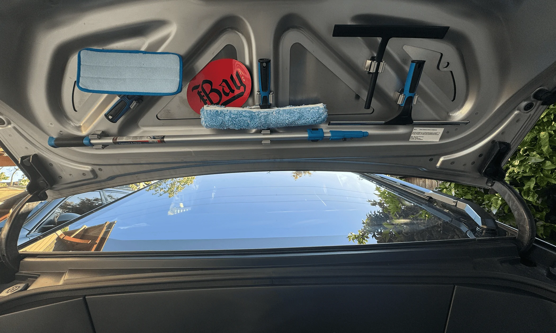 Tesla Cybertruck Cleaning inside of windshield -- using window cleaning mop with long handle 1715107956037-2f