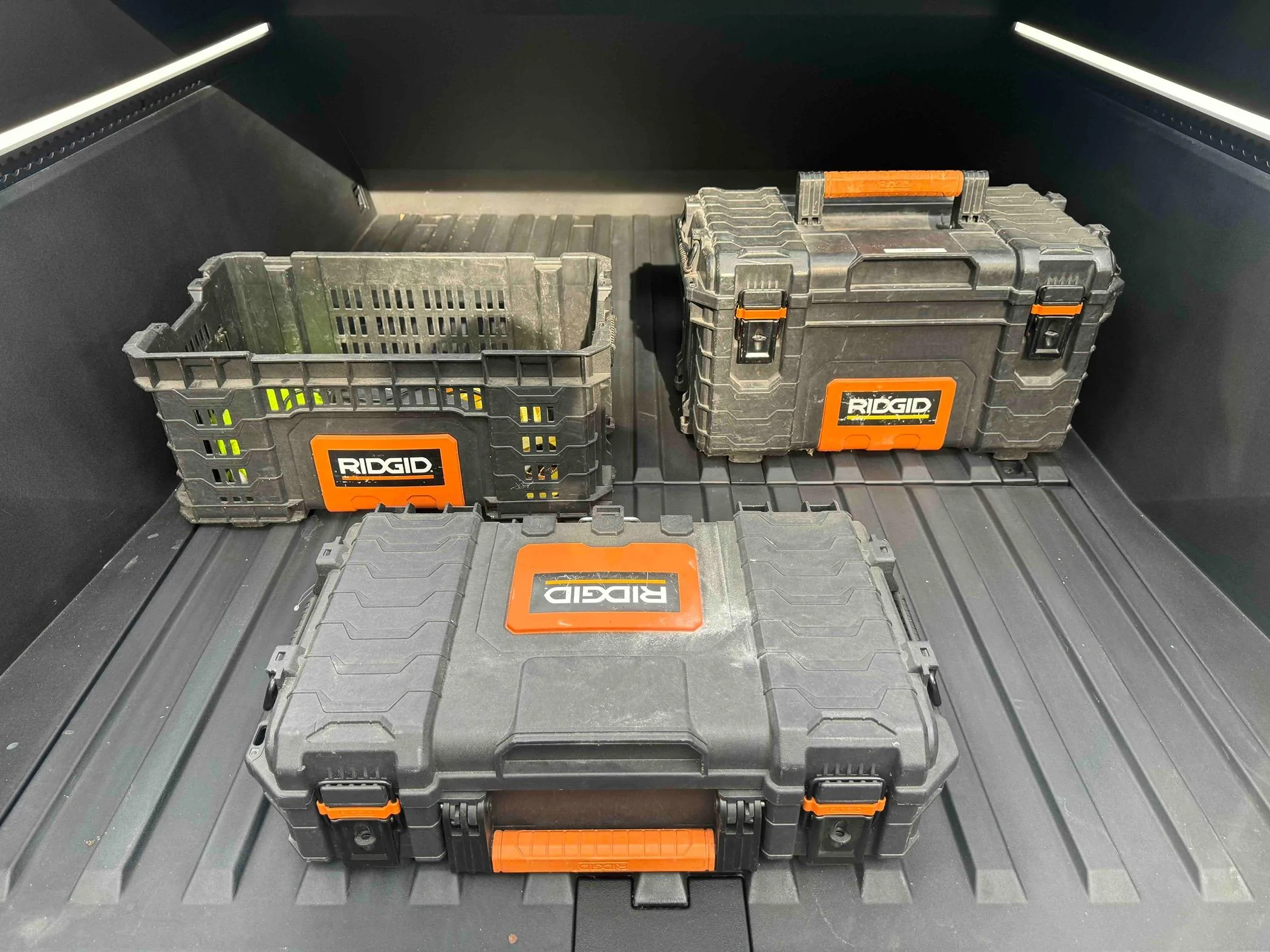 Tesla Cybertruck Ridgid toolbox slides right into bed floor grooves rigid boxes