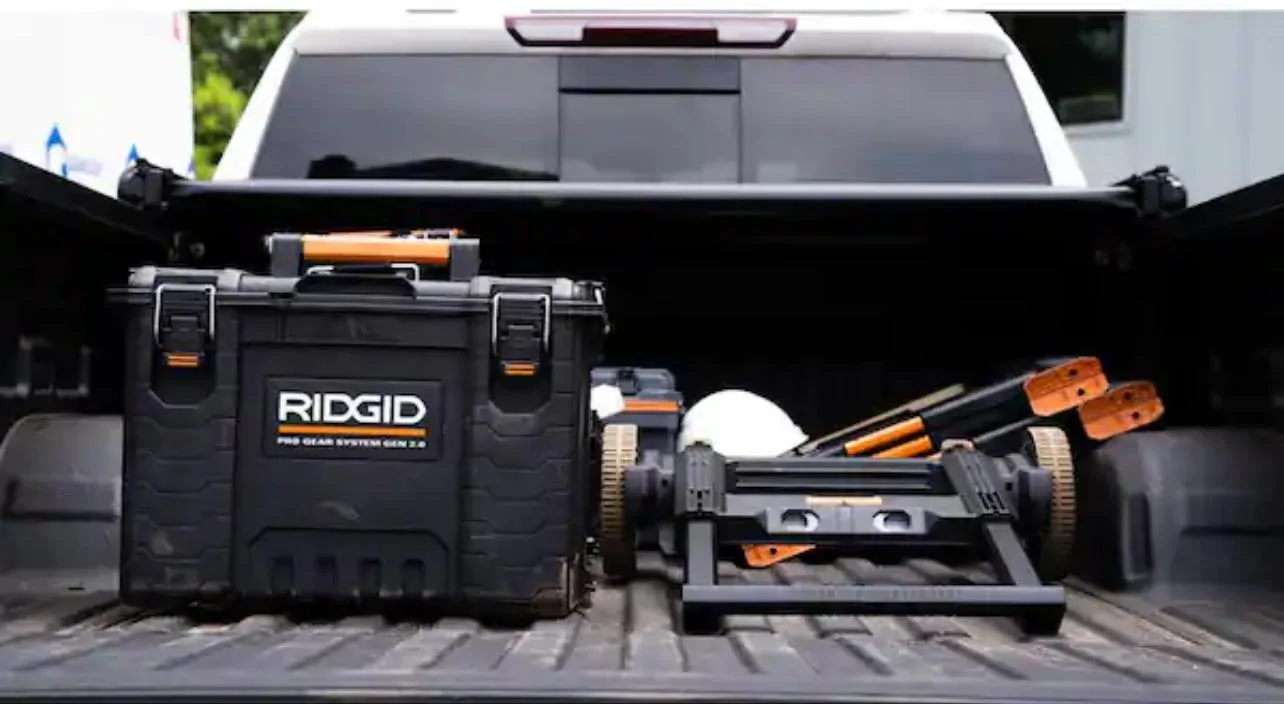 Tesla Cybertruck Ridgid toolbox slides right into bed floor grooves IMG_5123