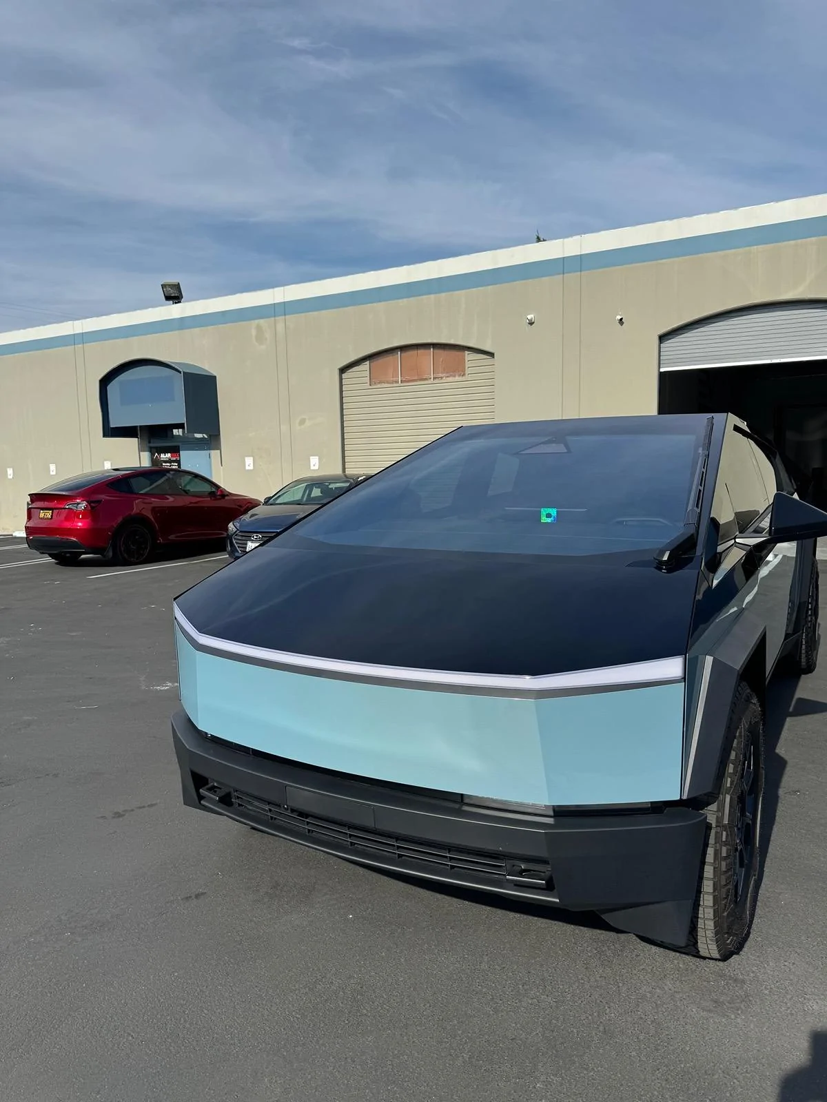 Tesla Cybertruck Two weeks = Two tone wrap (Inozetek Gloss Black / Bamboo) + T Sportline CT7 wheels.  I love it…. IMG_6957