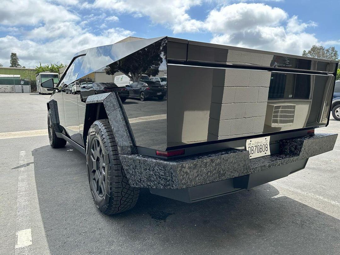 Cybertruck in STEK Dynoblack Gloss PPF + bumpers and fender flares in carbon fiber wrap 1.jpg
