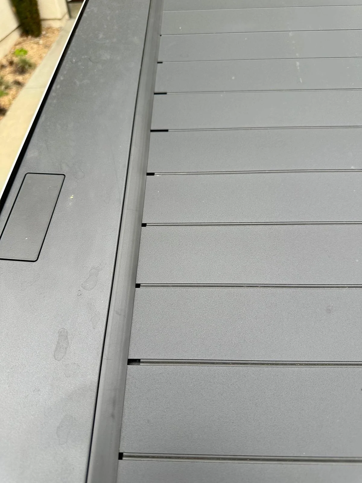 Tesla Cybertruck Tonneau Cover Weather Seals In between SLATS coming undone IMG_9859