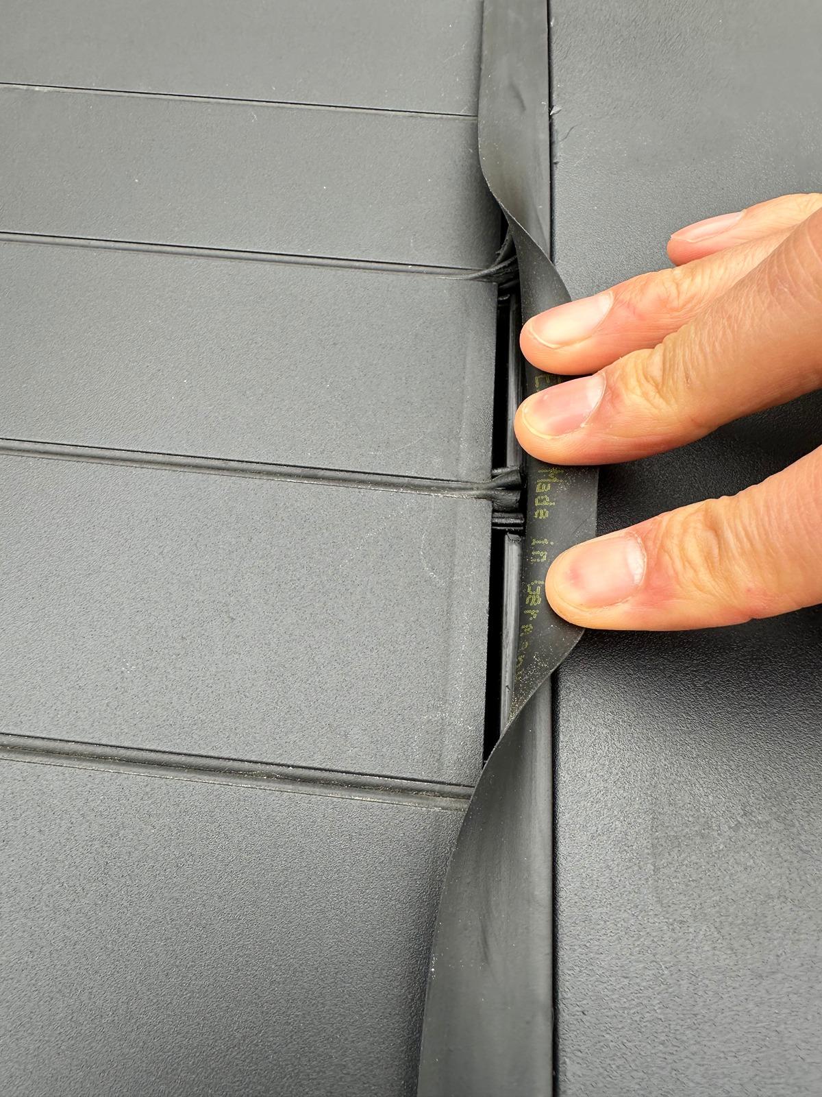 Tesla Cybertruck Tonneau Cover Weather Seals In between SLATS coming undone IMG_9858