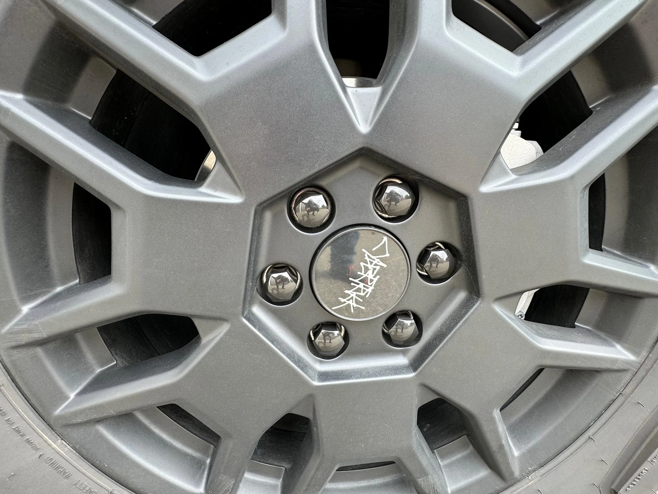 Tesla Cybertruck Rust in center of wheel hub? IMG_2733