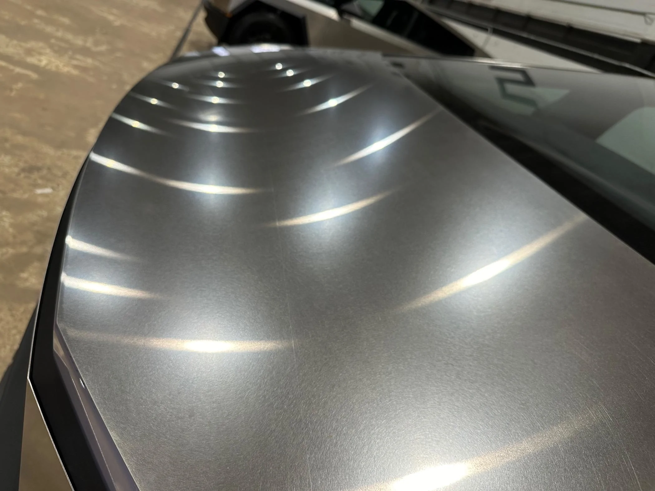 Tesla Cybertruck Big Scratches on SS at Delivery IMG_4226