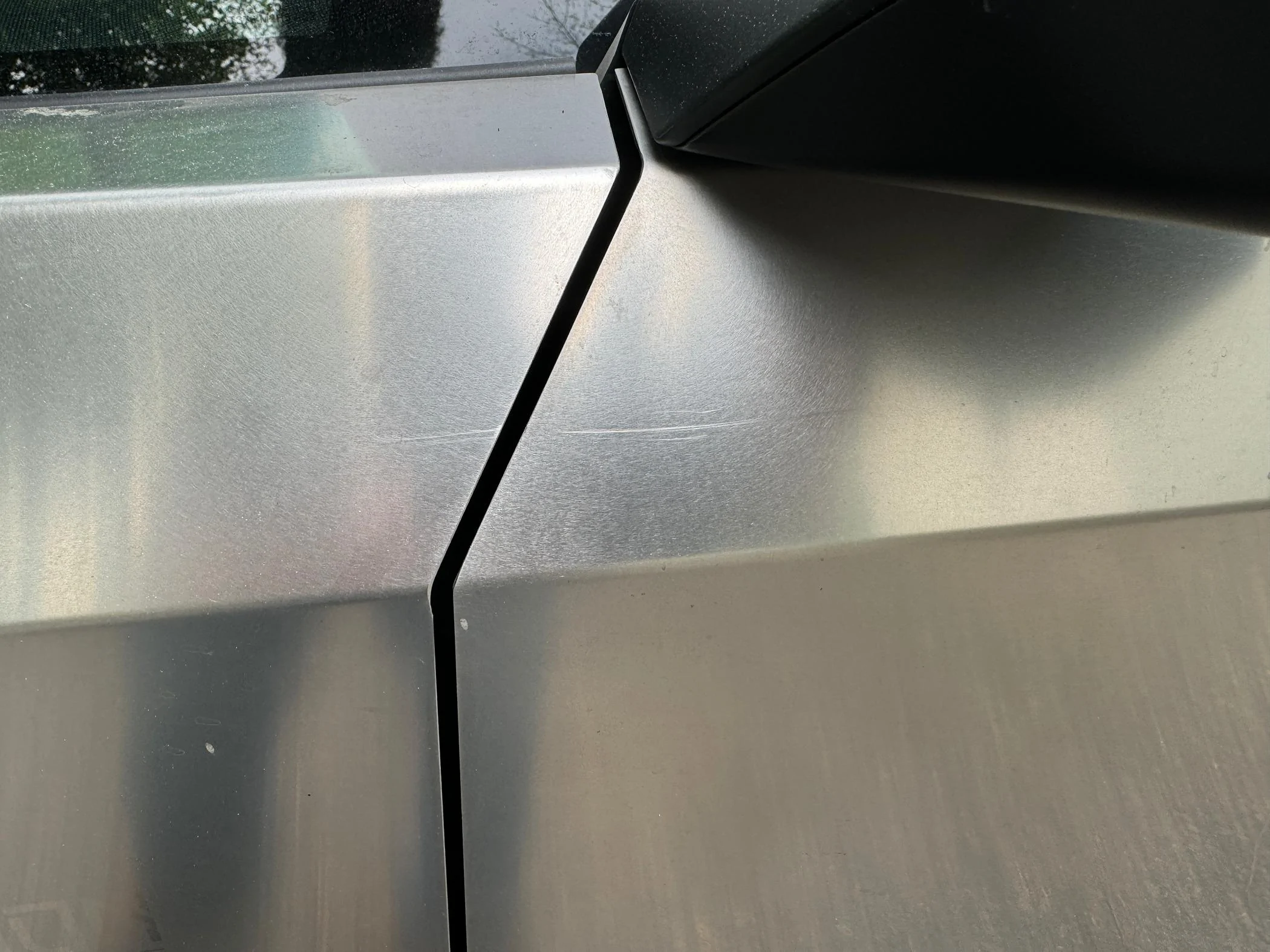Tesla Cybertruck Big Scratches on SS at Delivery - Similar to what others have reported DLD Driver Door1