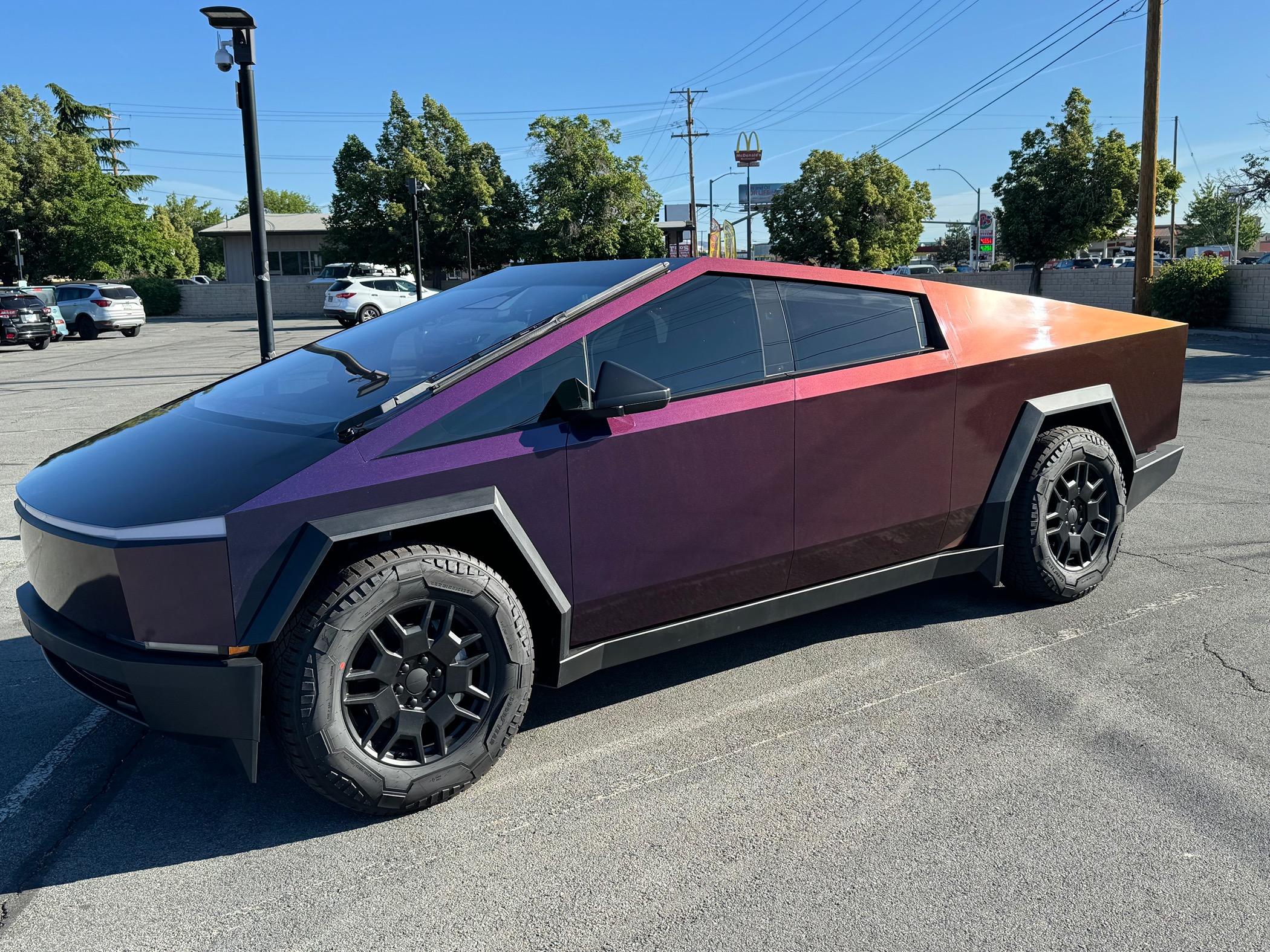 Tesla Cybertruck Gloss flip deep space wrap on my Cybertruck IMG_4186