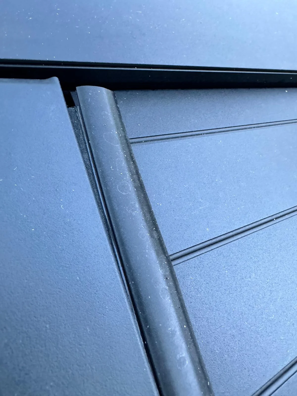 Tesla Cybertruck Weather strip on vault: partially coming out IMG_1006
