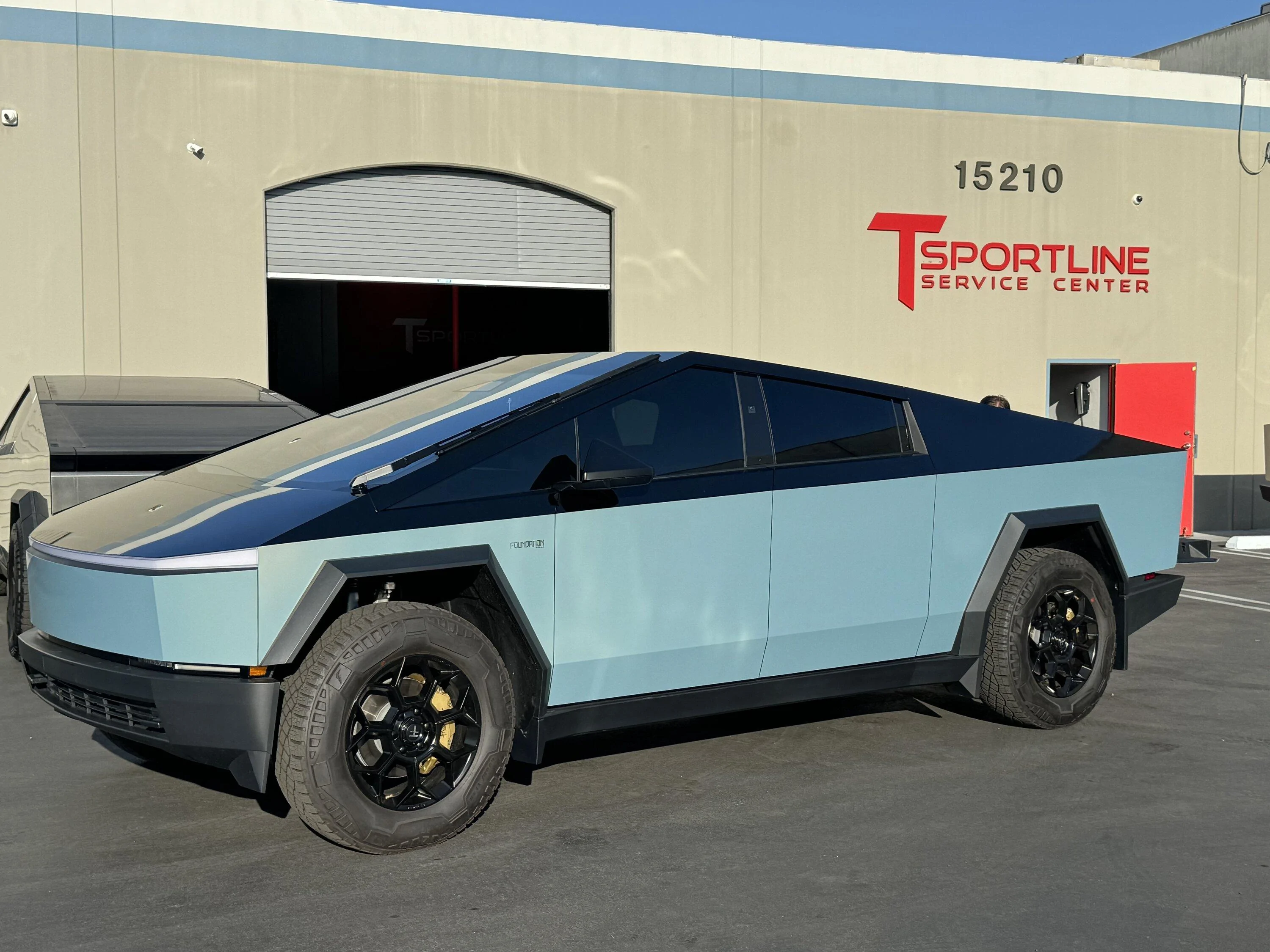 Tesla Cybertruck Finished my CT build (for now). Painted my brake Calipers (metallic gold/gloss black logo) IMG_7206