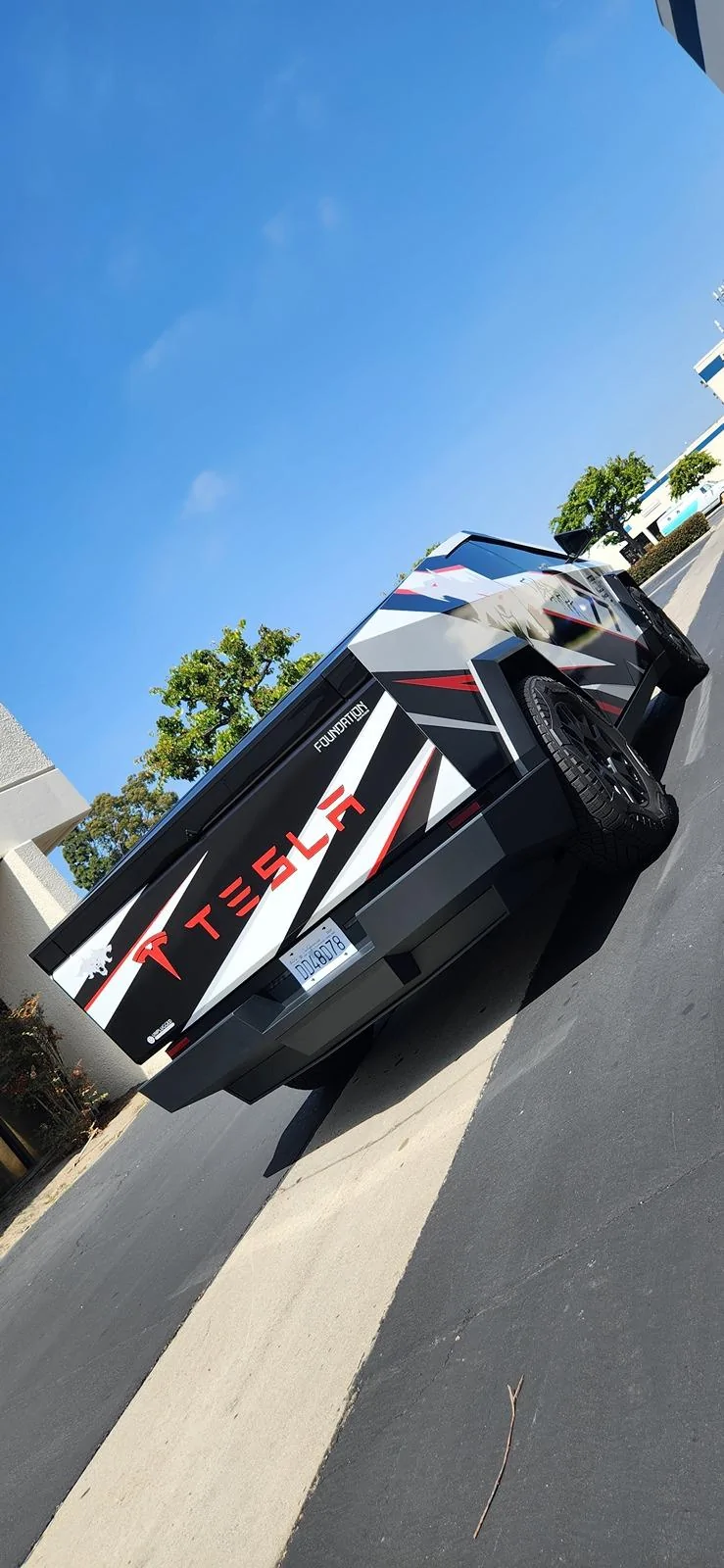 Tesla Cybertruck Beast custom printed wrap (Cerberus graphic) White 3M base and red painted calipers 20240530_144805