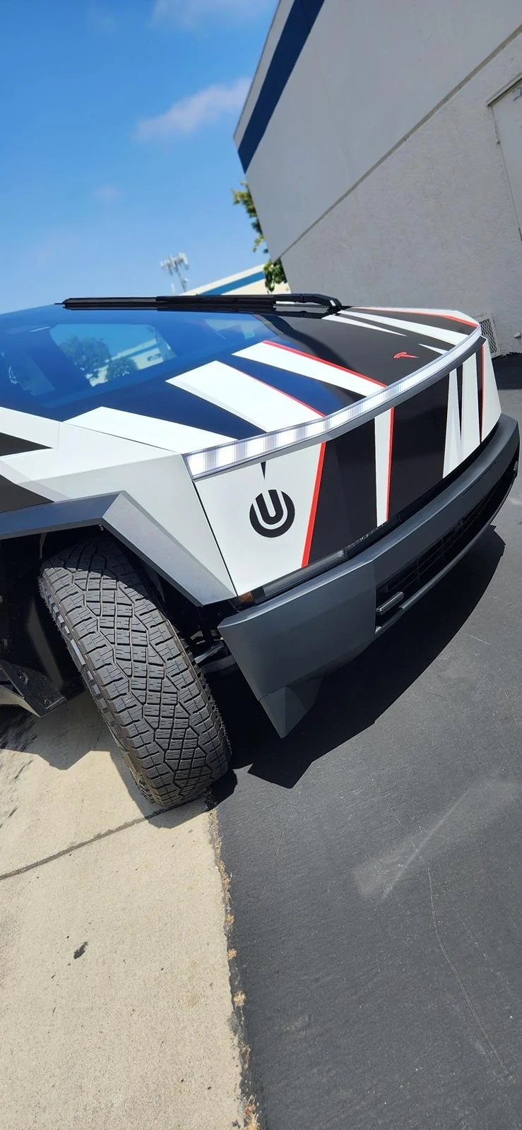Tesla Cybertruck Beast custom printed wrap (Cerberus graphic) White 3M base and red painted calipers 20240530_145145
