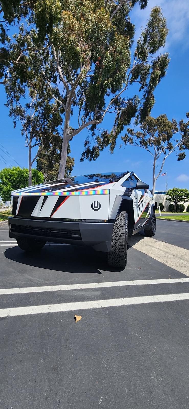 Tesla Cybertruck Beast custom printed wrap (Cerberus graphic) White 3M base and red painted calipers 20240530_142925