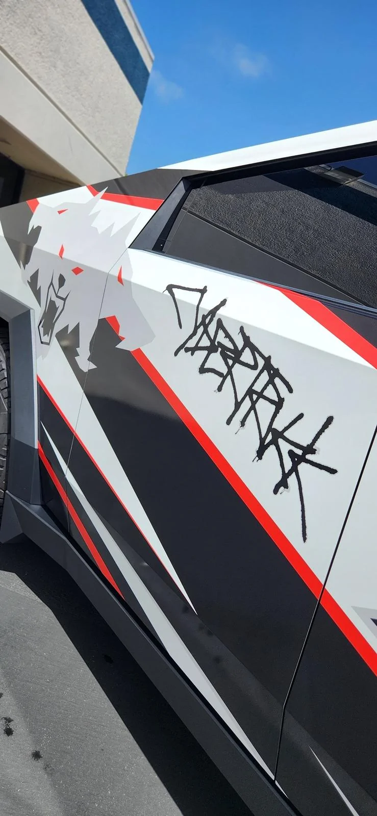 Tesla Cybertruck Beast custom printed wrap (Cerberus graphic) White 3M base and red painted calipers 20240530_145133