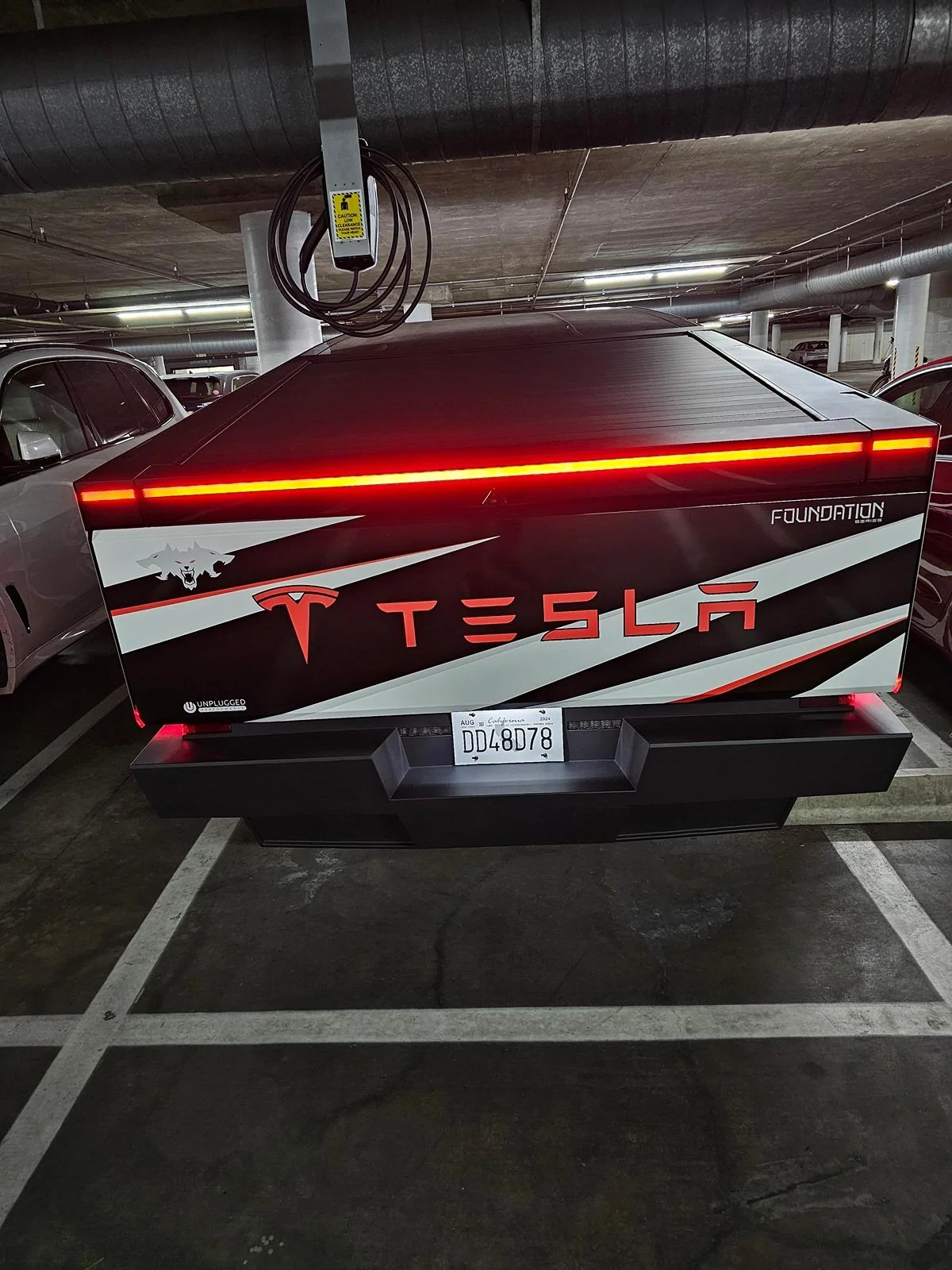 Tesla Cybertruck Beast custom printed wrap (Cerberus graphic) White 3M base and red painted calipers 20240530_165214