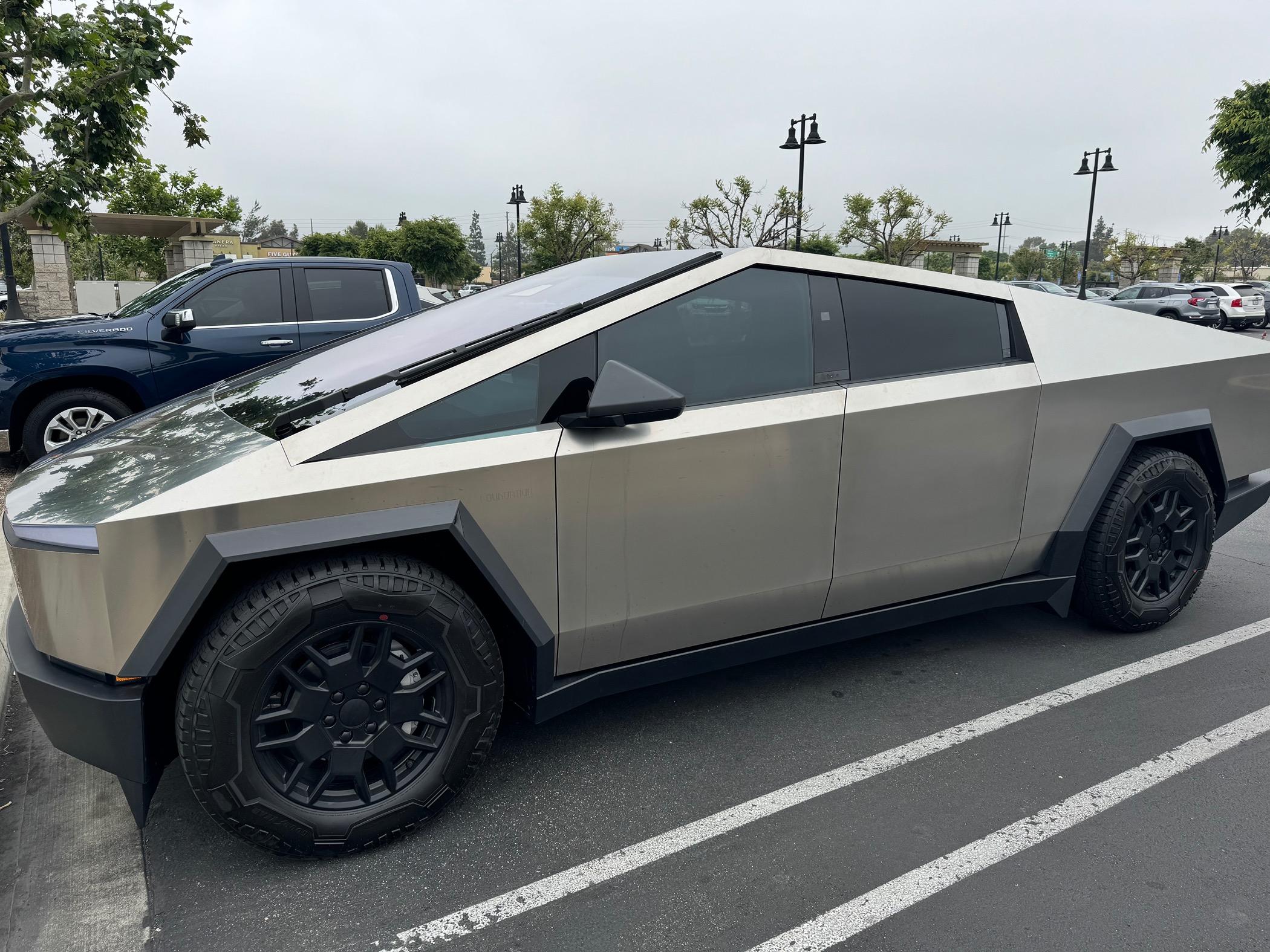 Tesla Cybertruck Use Sprayway Glass Cleaner for cleaning fingerprints off Cybertruck stainless steel IMG_4132