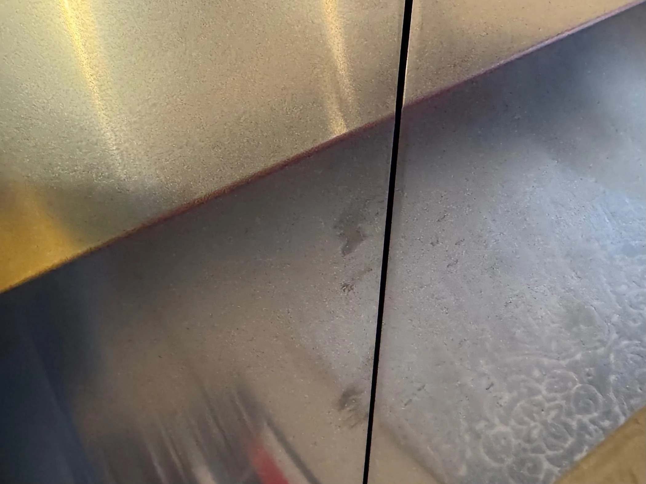 Tesla Cybertruck Use Sprayway Glass Cleaner for cleaning fingerprints off Cybertruck stainless steel IMG_2817