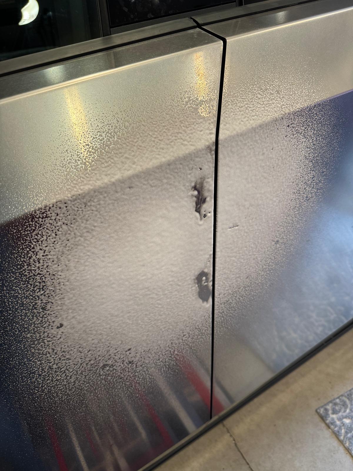 Tesla Cybertruck Use Sprayway Glass Cleaner for cleaning fingerprints off Cybertruck stainless steel IMG_2819
