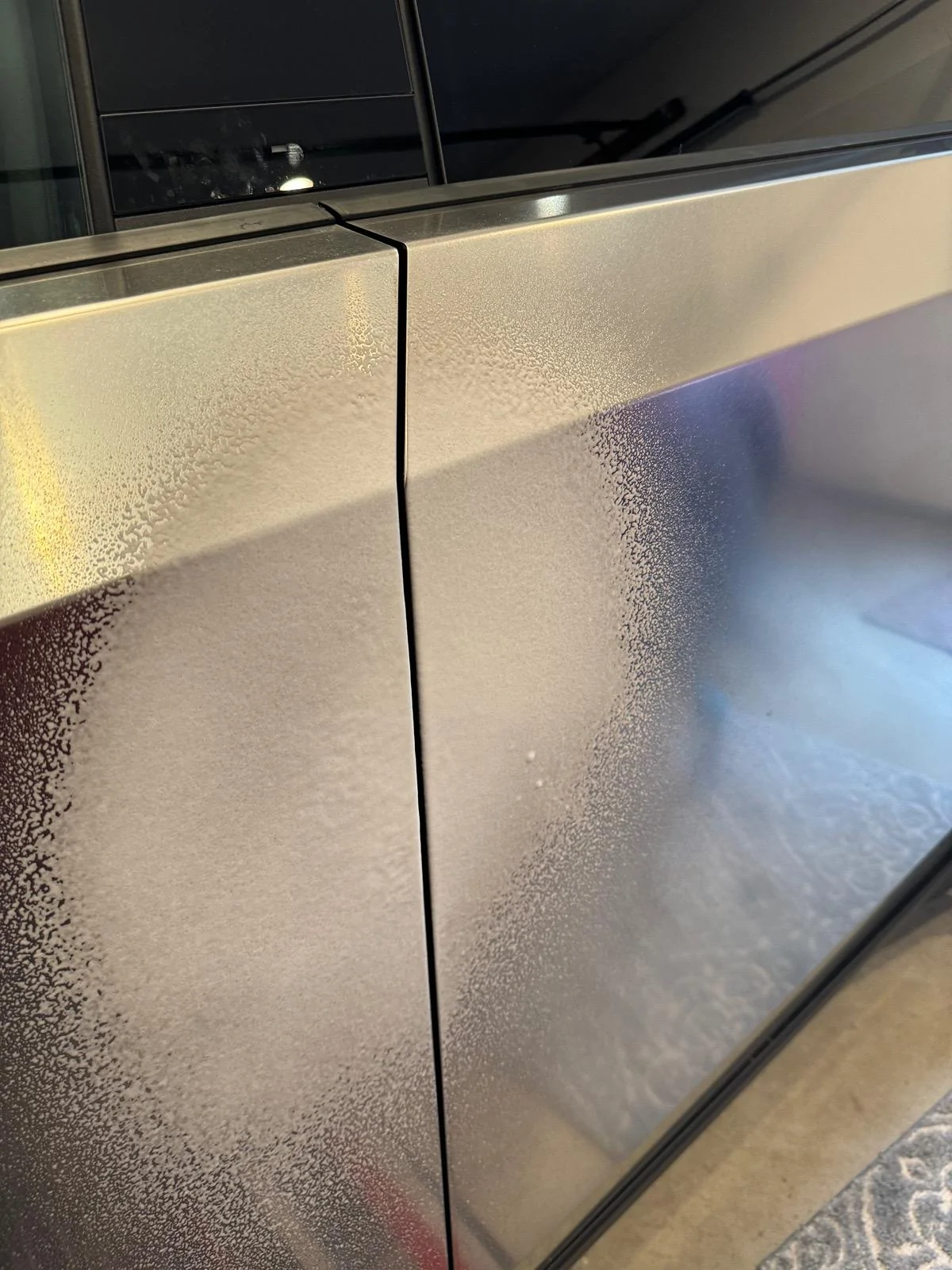 Tesla Cybertruck Use Sprayway Glass Cleaner for cleaning fingerprints off Cybertruck stainless steel IMG_2821