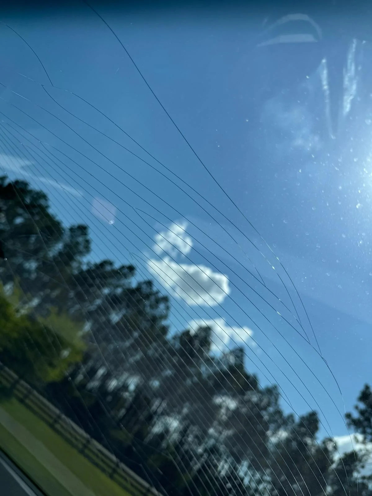 Tesla Cybertruck Wind Shield Cracked while parked IMG_6898