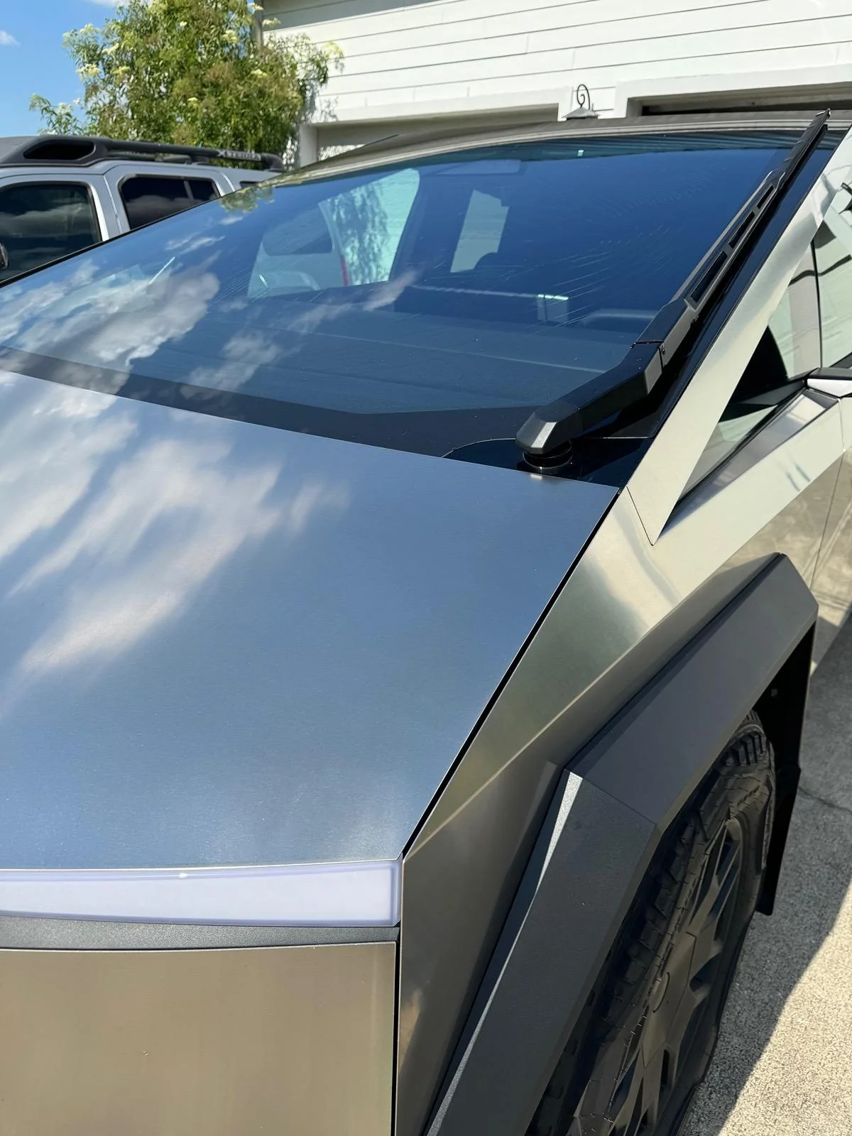 Tesla Cybertruck Wind Shield Cracked while parked IMG_6902