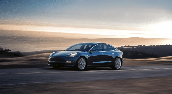 Tesla Cybertruck Tesla Model 3 Surpasses VW ID.3 In Germany, Becomes Country's No. 2 EV Bestseller In February model_3_-_blue_driving_8
