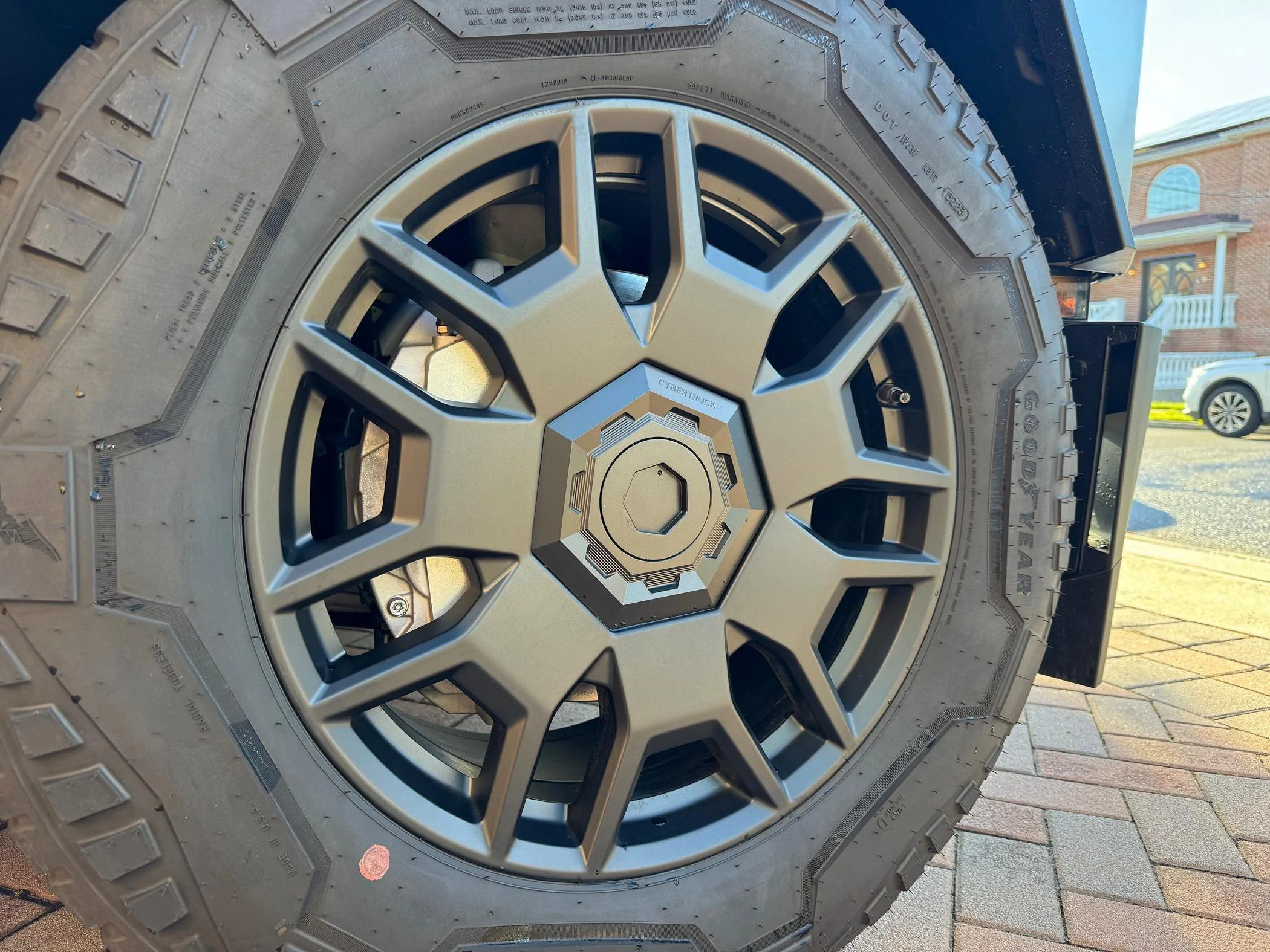 Tesla Cybertruck Cybertruckco aluminum locking wheel caps installed - review and pics IMG_0085