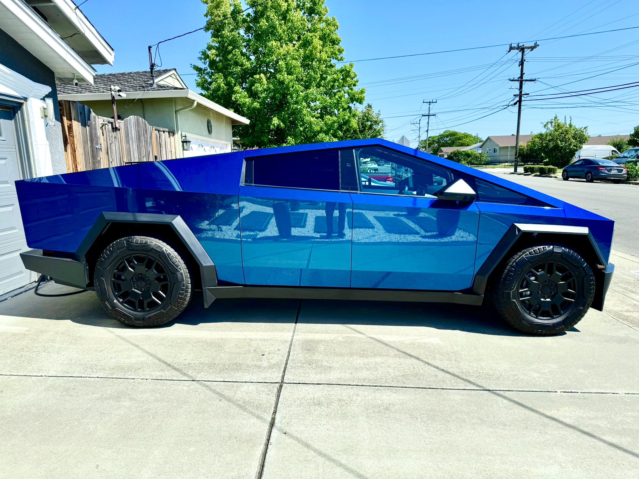 Tesla Cybertruck Where are the hubcaps? And… check out my new wrap! IMG_7695