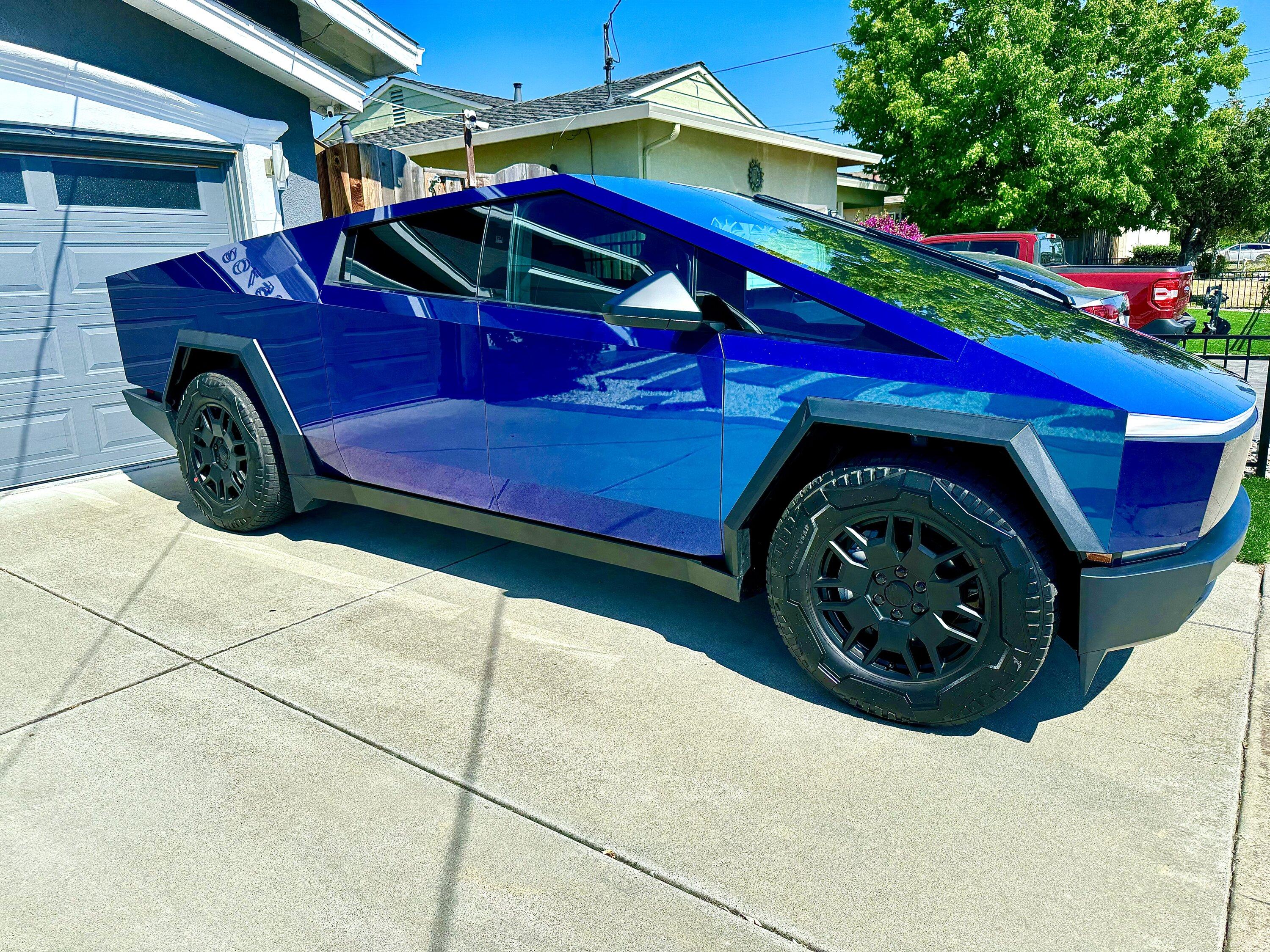 Tesla Cybertruck Where are the hubcaps? And… check out my new wrap! IMG_7694