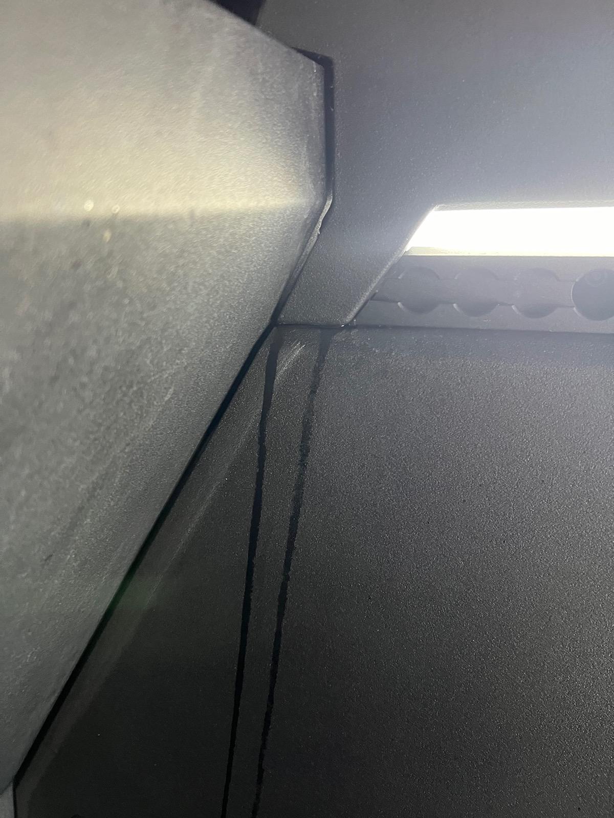 Tesla Cybertruck Water in truck bed after heavy rain or washing IMG_7449