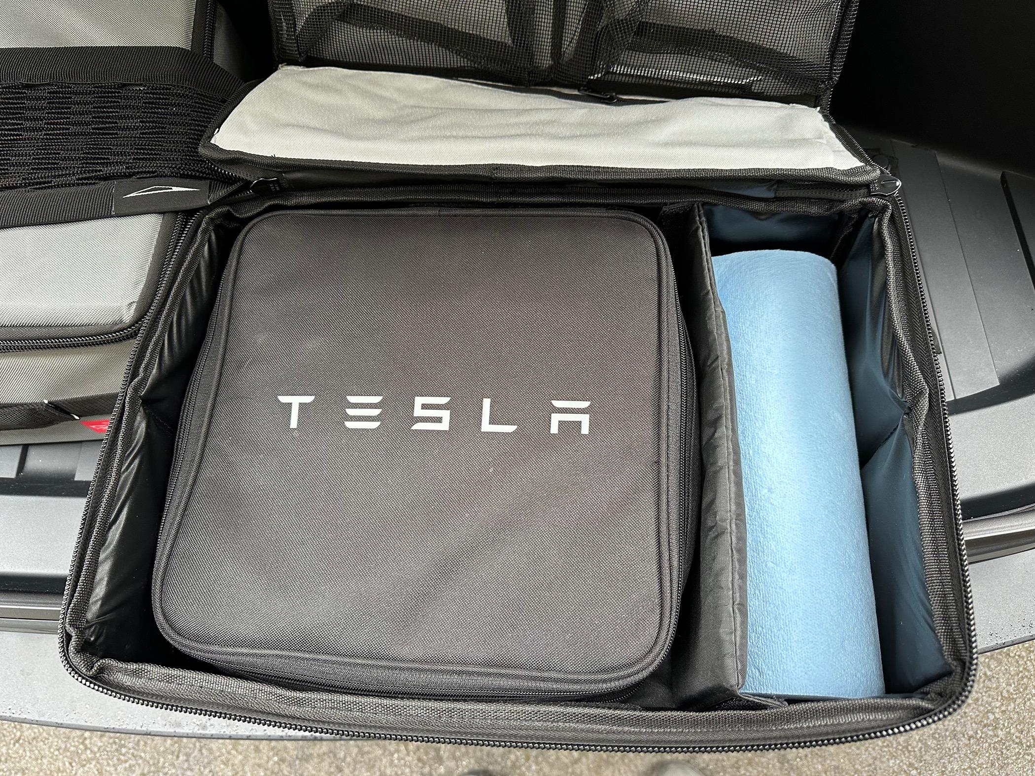Tesla Cybertruck Love these FrontRunner Flat Packs in my Frunk. IMG_1559