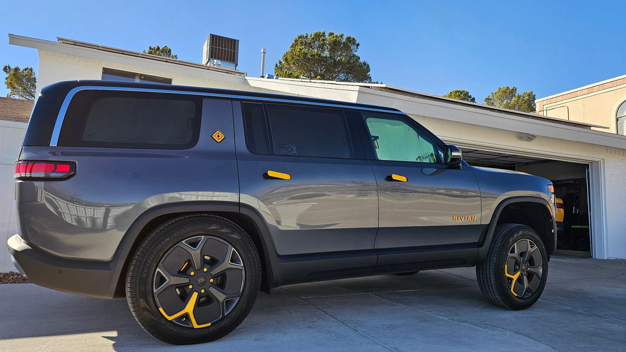 Tesla Cybertruck SLAMMED matte black Cybertruck on deflate all air suspension mode 20240127_150426