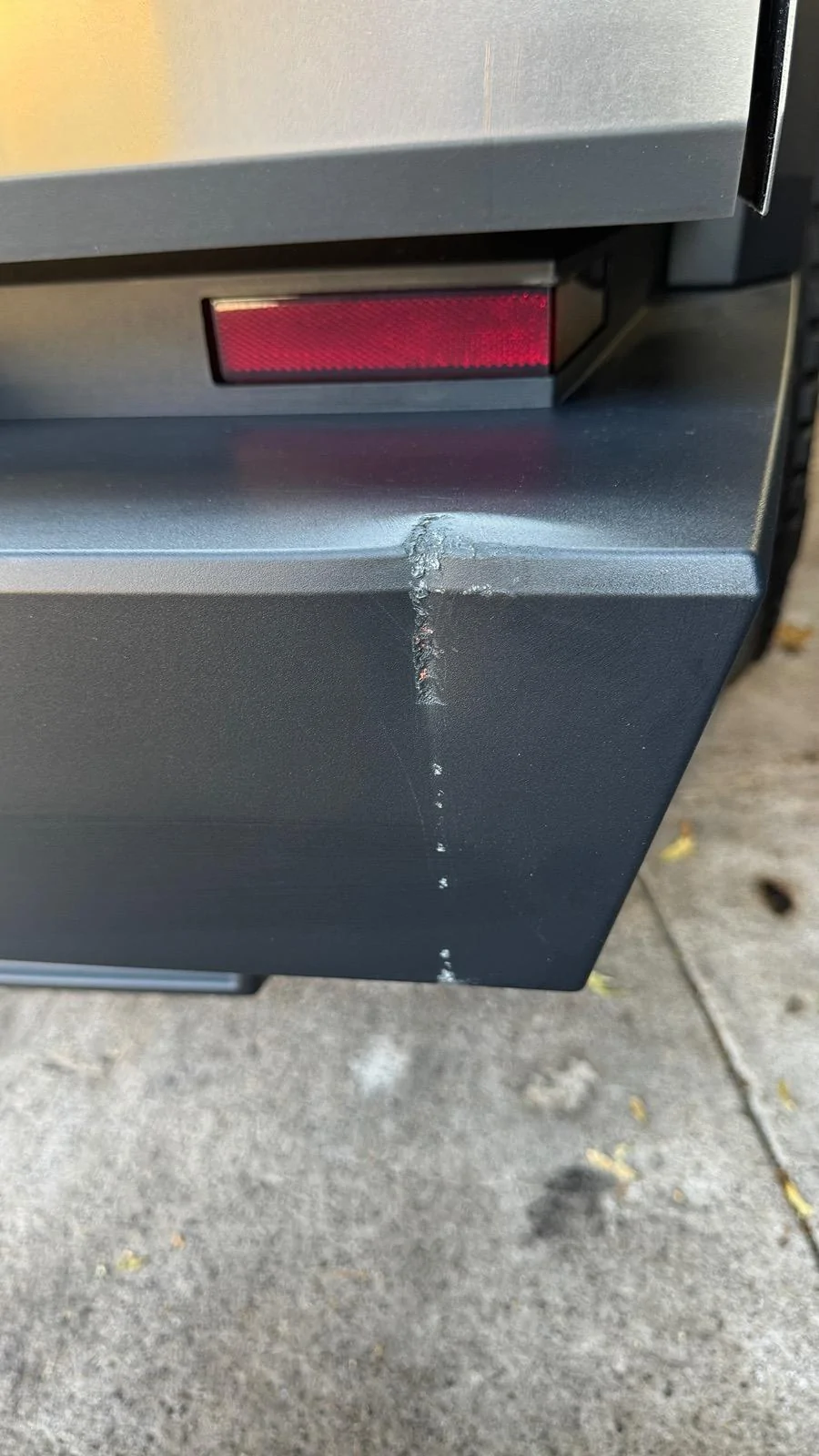 Tesla Cybertruck My Bumper! I F*ed up backing up! Replacement needed? IMG_2782