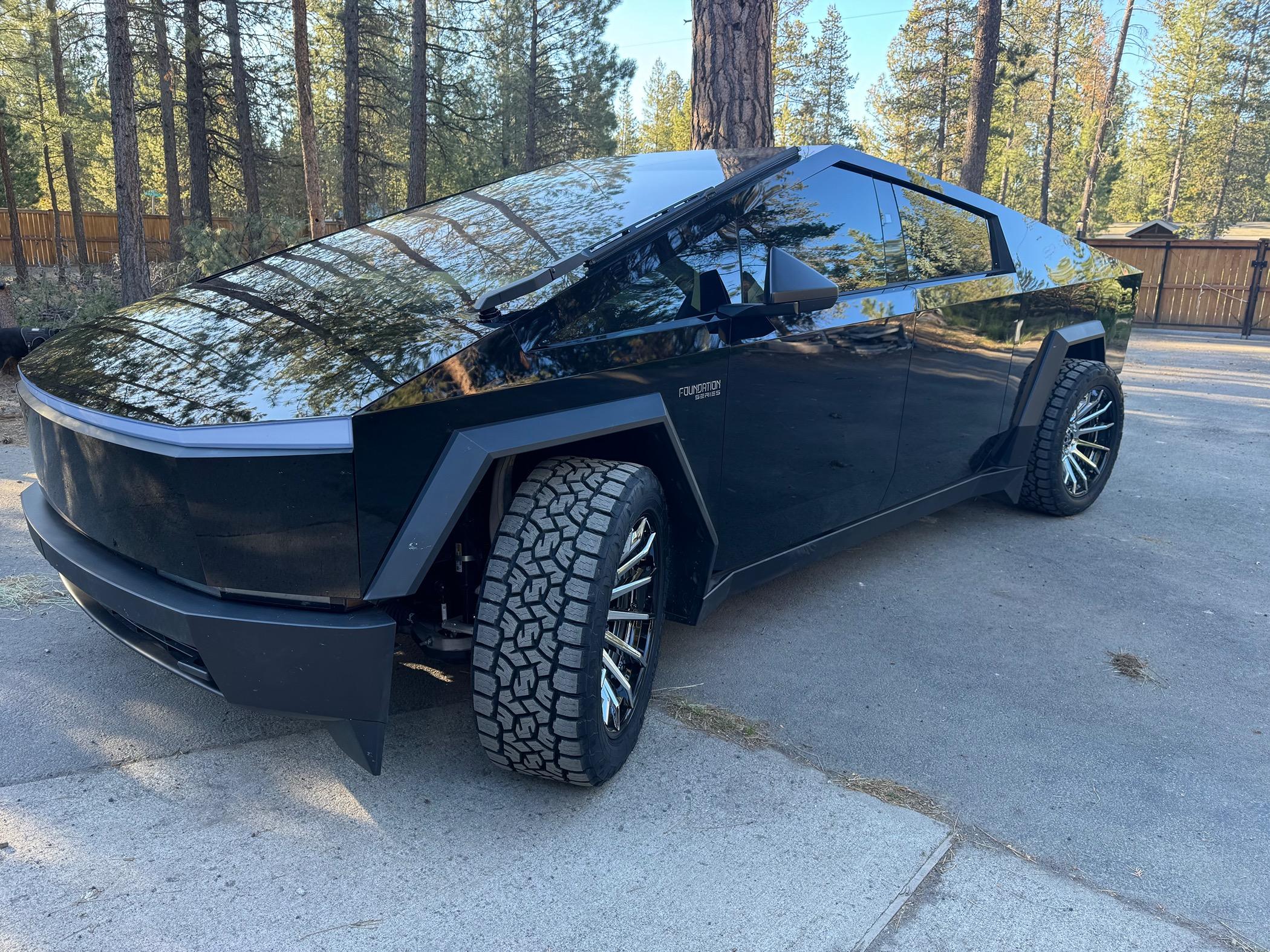Tesla Cybertruck Aftermarket tires and wheels on STEK High Gloss Black PPF Cybertruck in Oregon IMG_0891