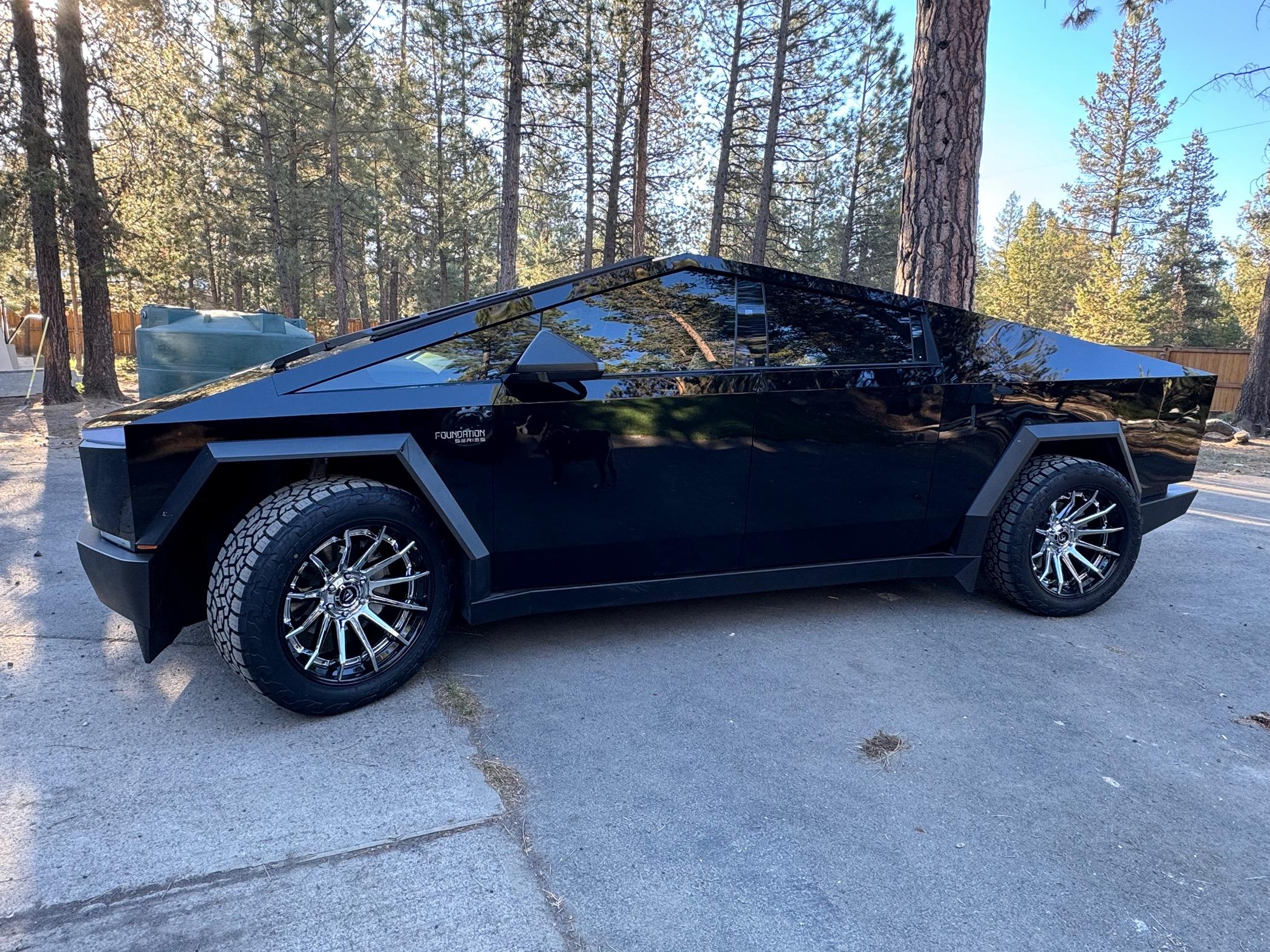 Tesla Cybertruck Aftermarket tires and wheels on STEK High Gloss Black PPF Cybertruck in Oregon IMG_0892