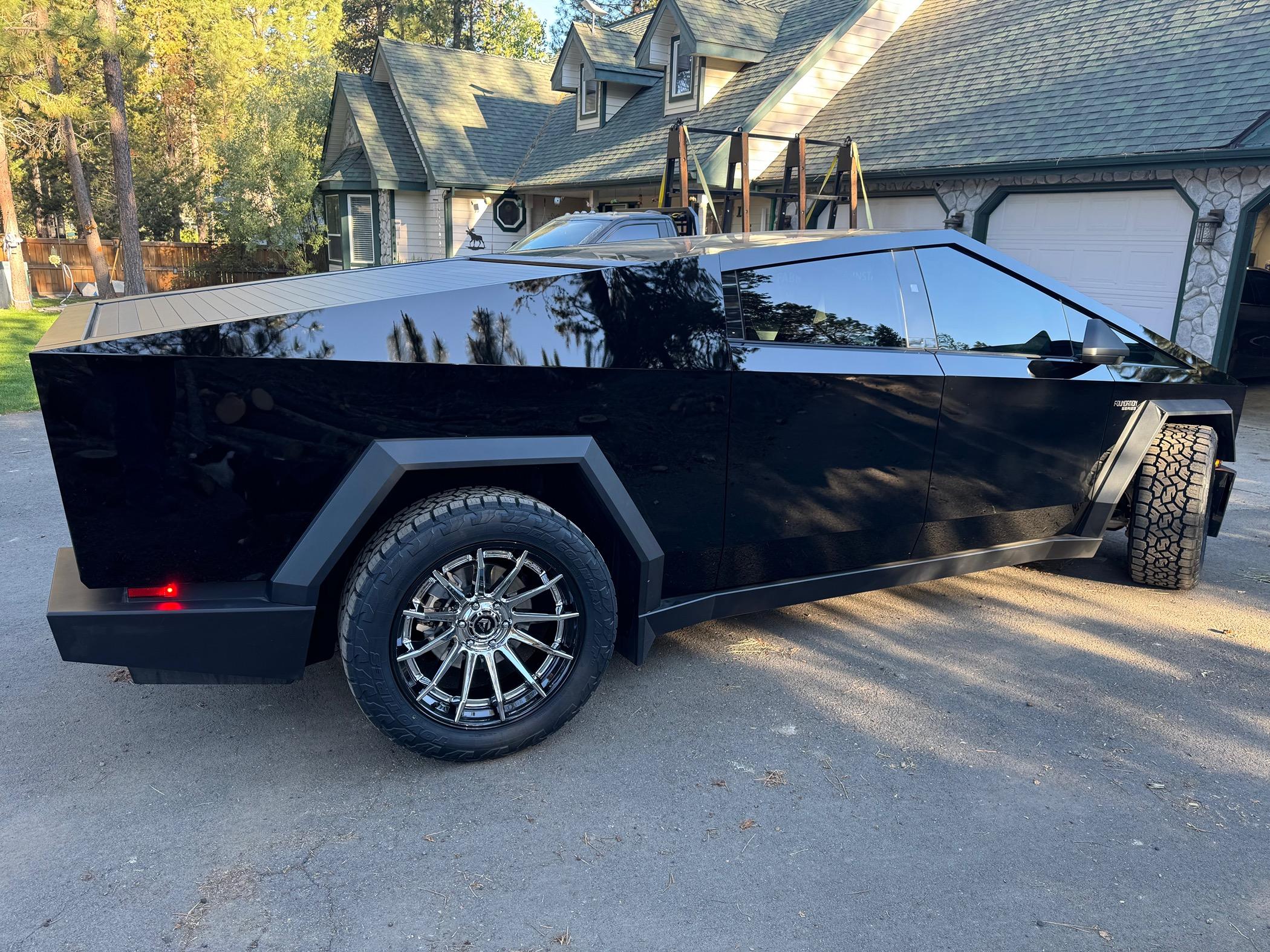 Tesla Cybertruck Aftermarket tires and wheels on STEK High Gloss Black PPF Cybertruck in Oregon IMG_0885