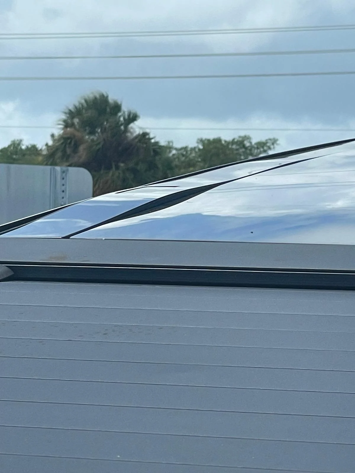 Tesla Cybertruck Plastic trim (roof applique) bowing IMG_0381