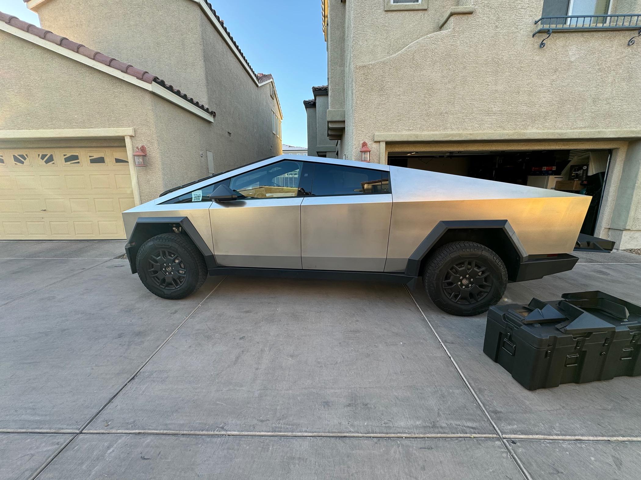 Tesla Cybertruck Mud flaps and cargo cases!!! Check it out! IMG_2616