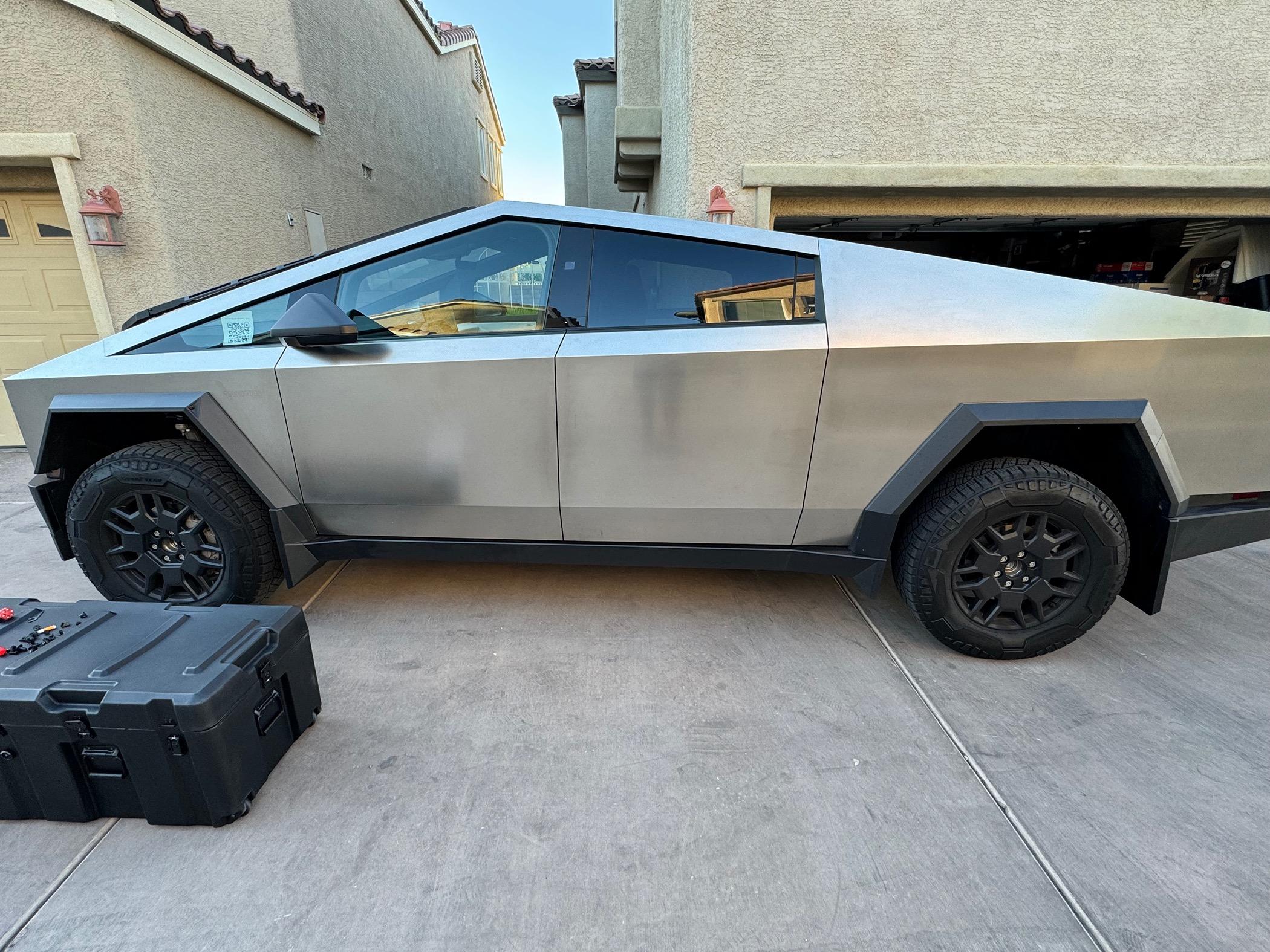 Tesla Cybertruck Mud flaps and cargo cases!!! Check it out! IMG_2617