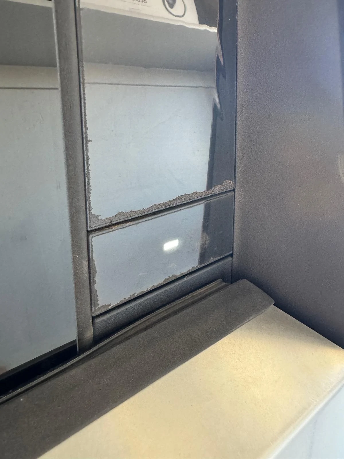 Tesla Cybertruck Oily substance around door button (solved: removed protective film) IMG_9314