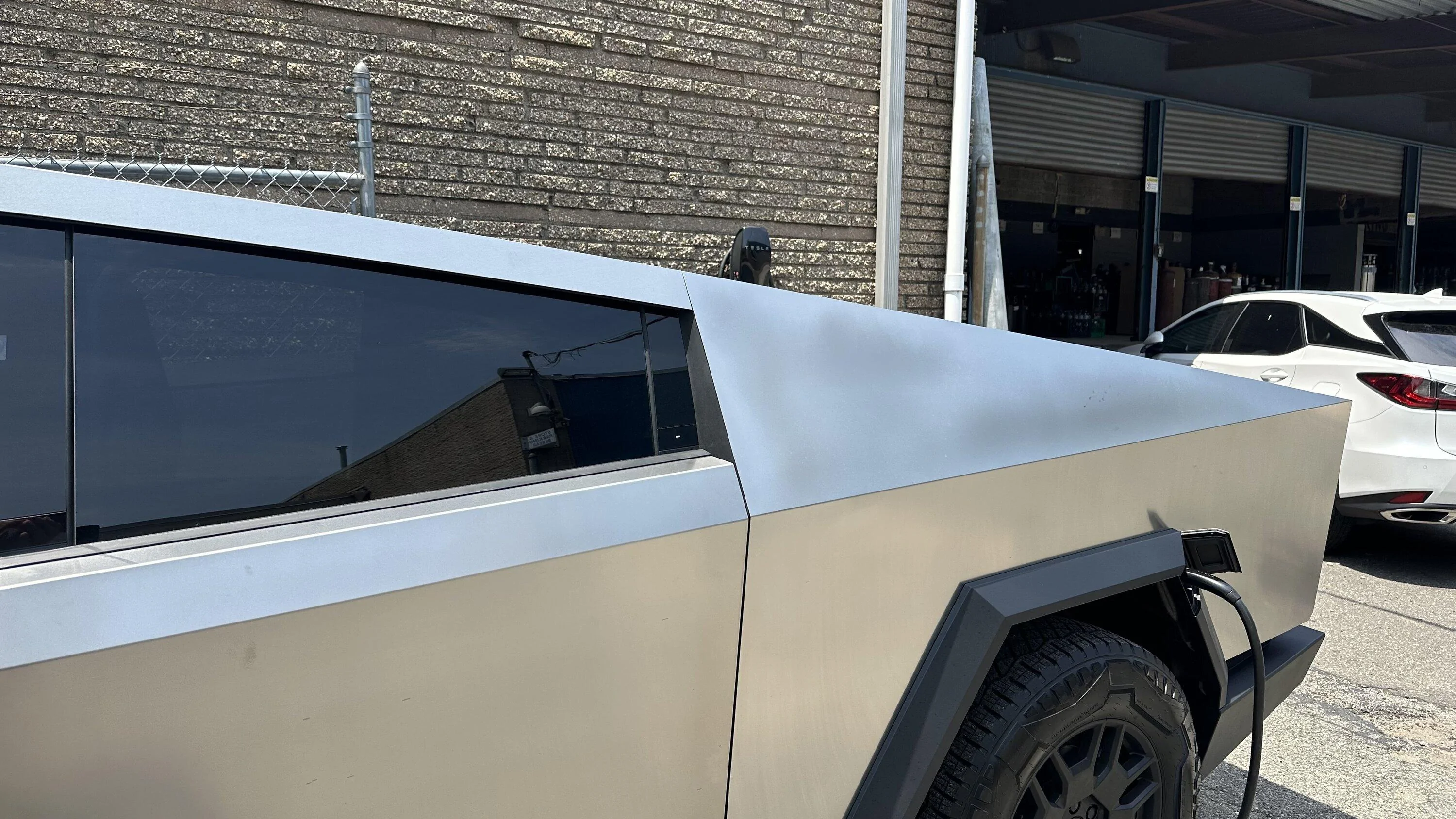 Tesla Cybertruck Discolored metal after scratches polished out during delivery IMG_7037