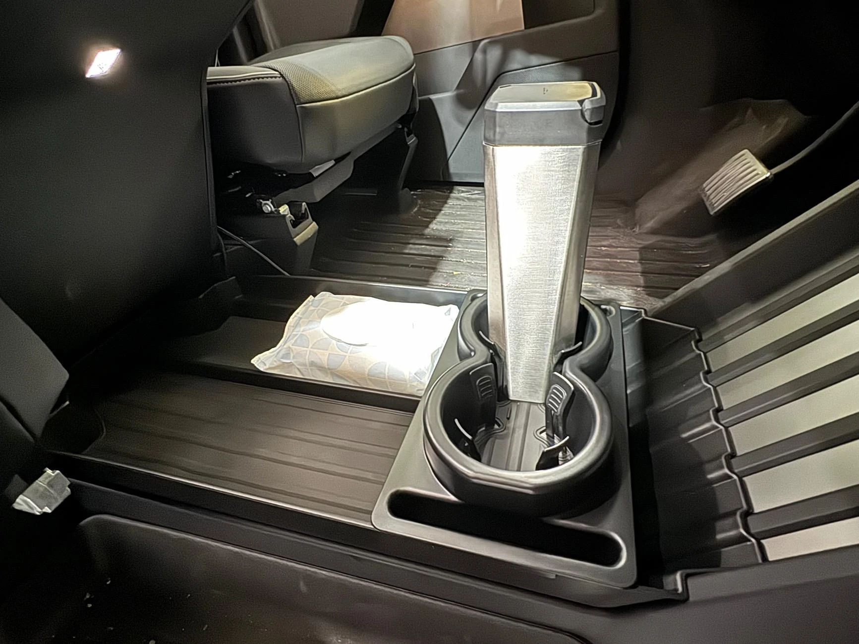 Tesla Cybertruck Installed a Lower Center Console Floor Organizer IMG_6723