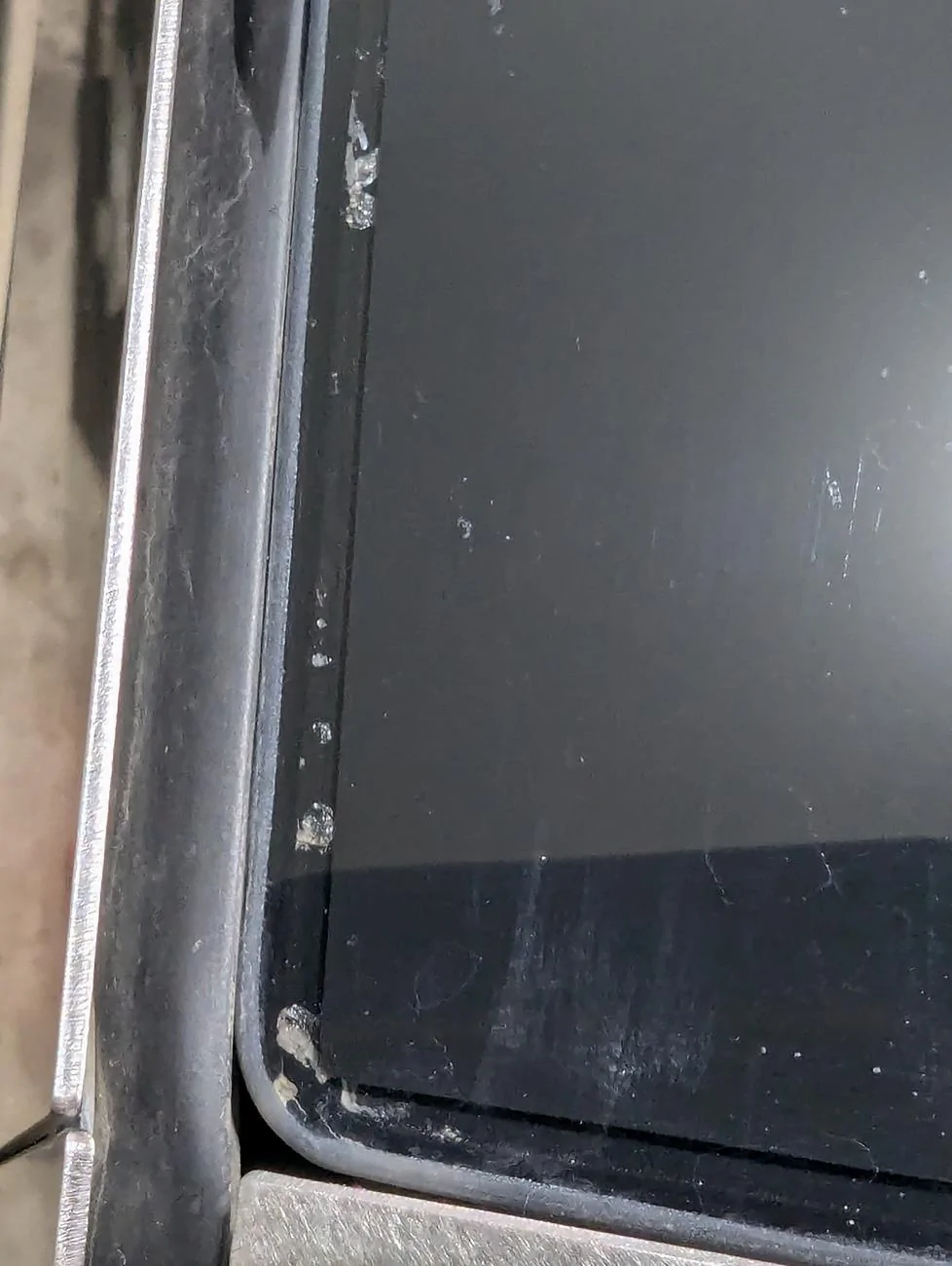 Tesla Cybertruck Windshield bubbles in the side PXL_20240703_230917015.MP