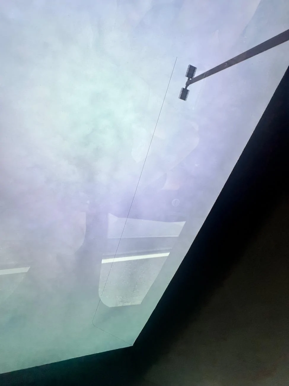 Tesla Cybertruck Watch my Cybertruck ceiling glass spontaneously crack in near real time IMG_2392