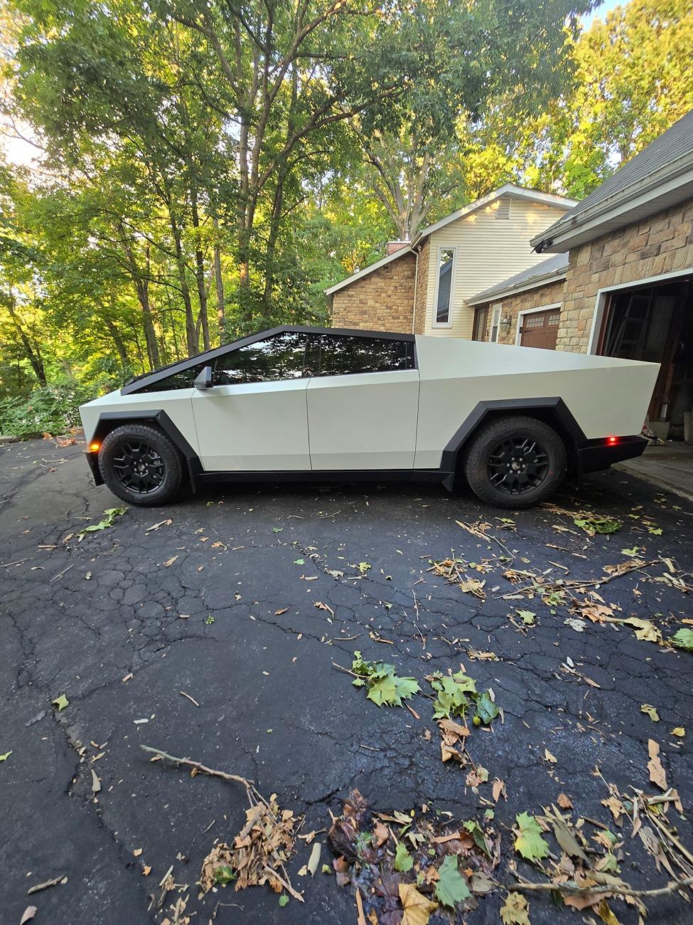 Tesla Cybertruck We did it! Pearl white wrap and Tesla logo on front lightbar 20240705_191924