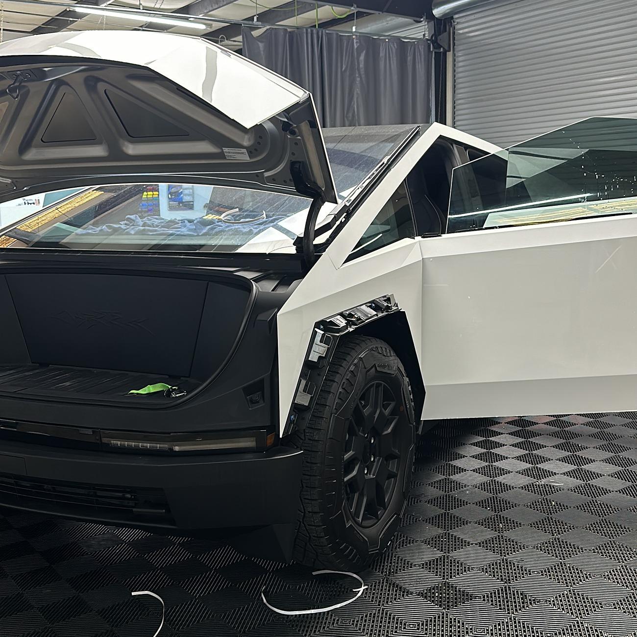 Tesla Cybertruck STEK DynoWhite + TRON look + Hub Covers with red accents (by TESBROS) 7E86B63E-61DA-42F9-847B-698F0381CCED