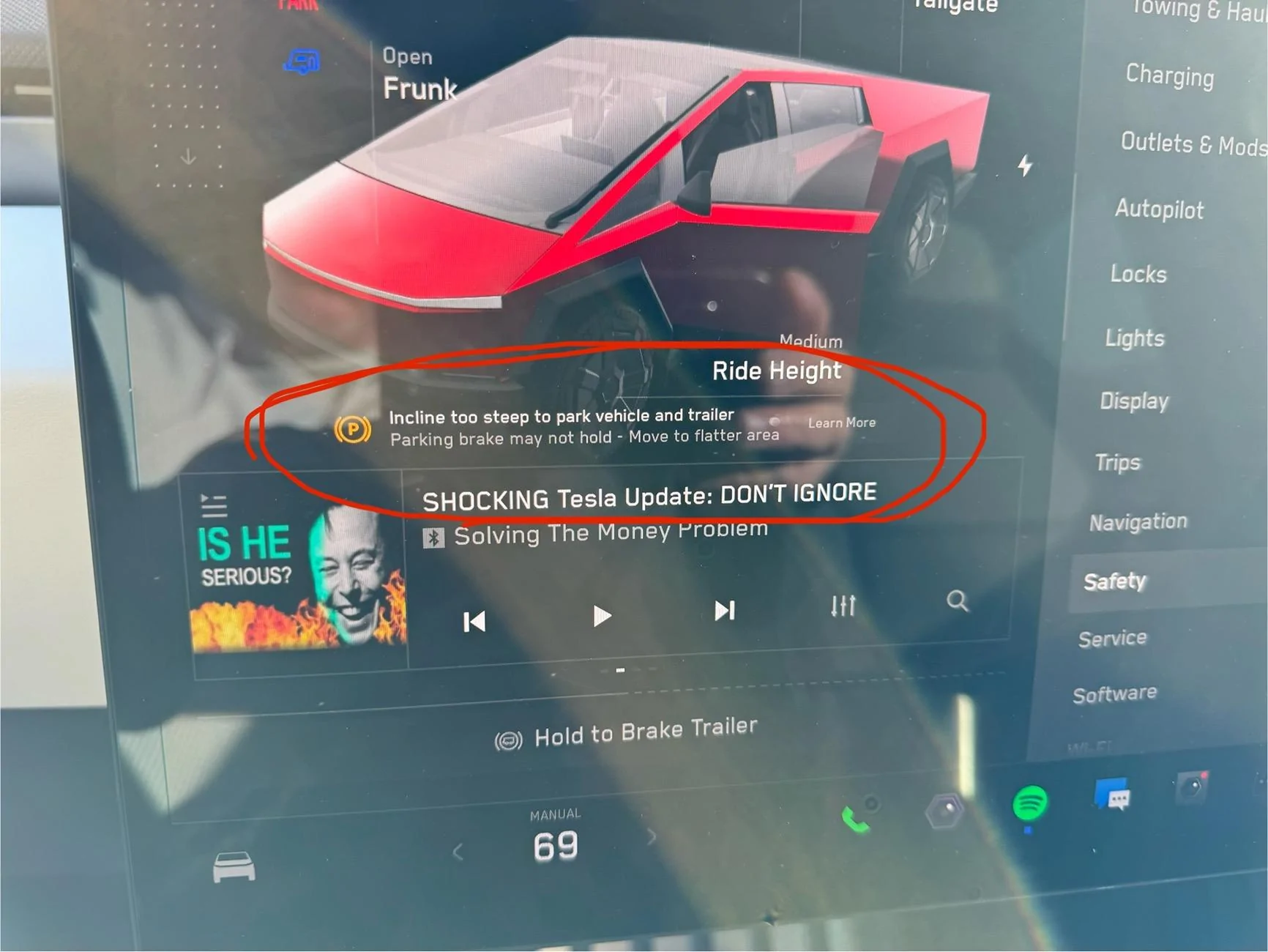 Tesla Cybertruck Question for all the boaters out there -- "parking brake not holding" message when launching / retrieving boat IMG_8893