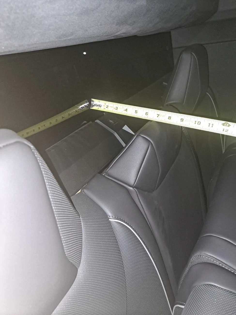Tesla Cybertruck Do rear seats fold forward for storage? 20240711_202916