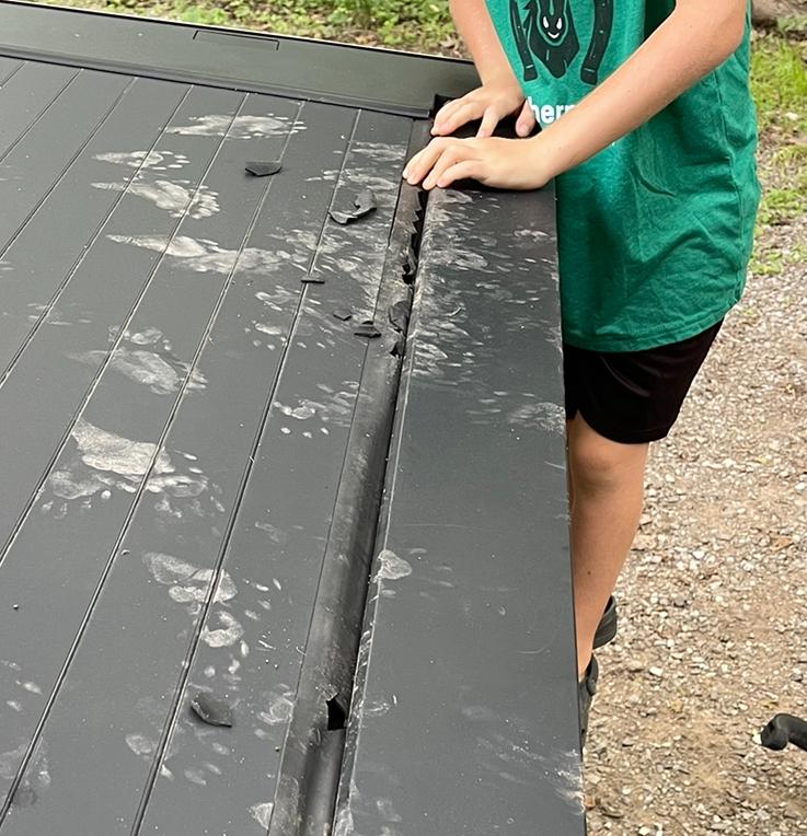 Tesla Cybertruck Raccoon Damages Cybertruck Bed Vault Tonneau Cover IMG_8797