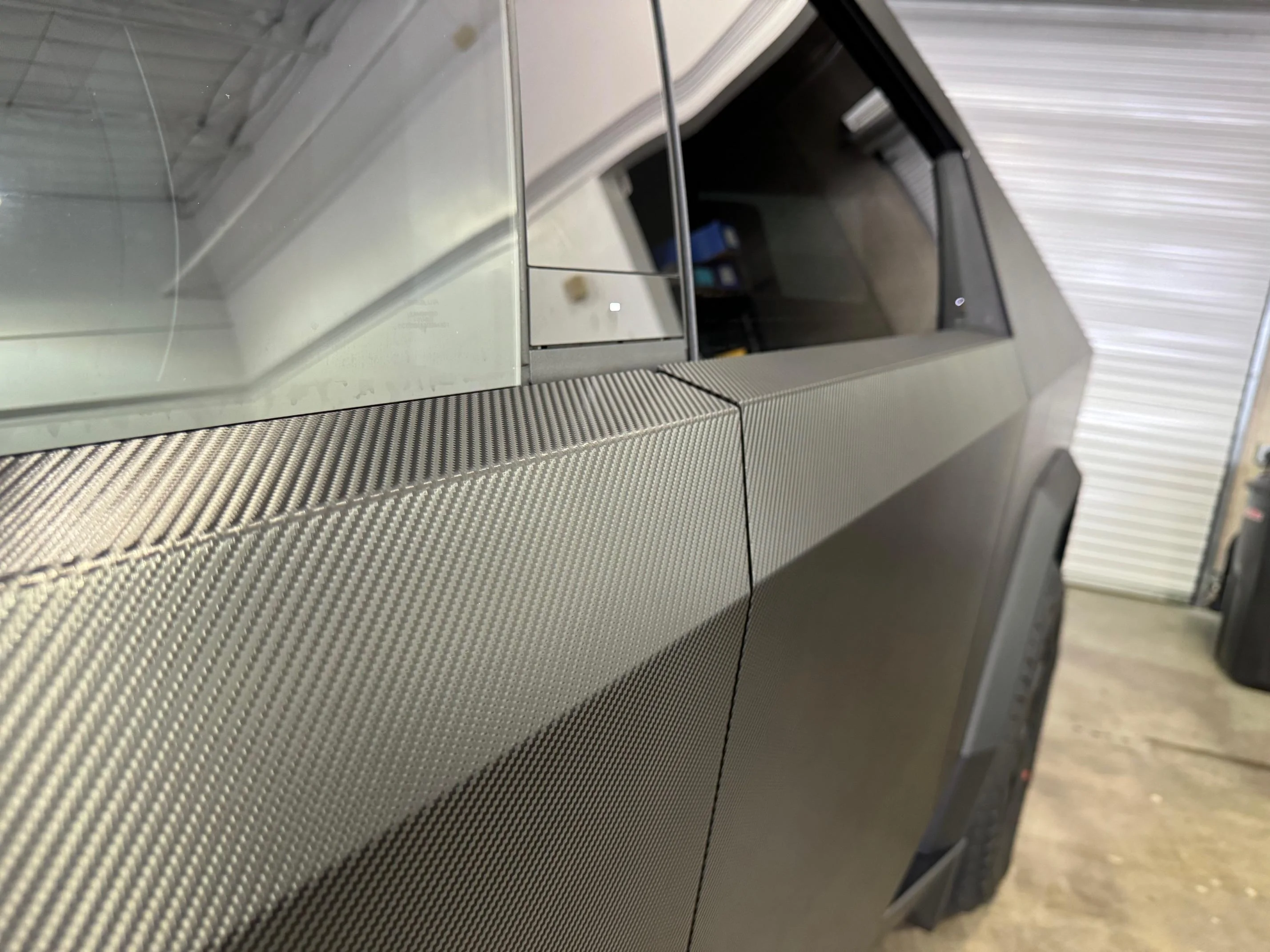 Tesla Cybertruck Carbon Fiber Black Wrap on my Cybertruck IMG_6084